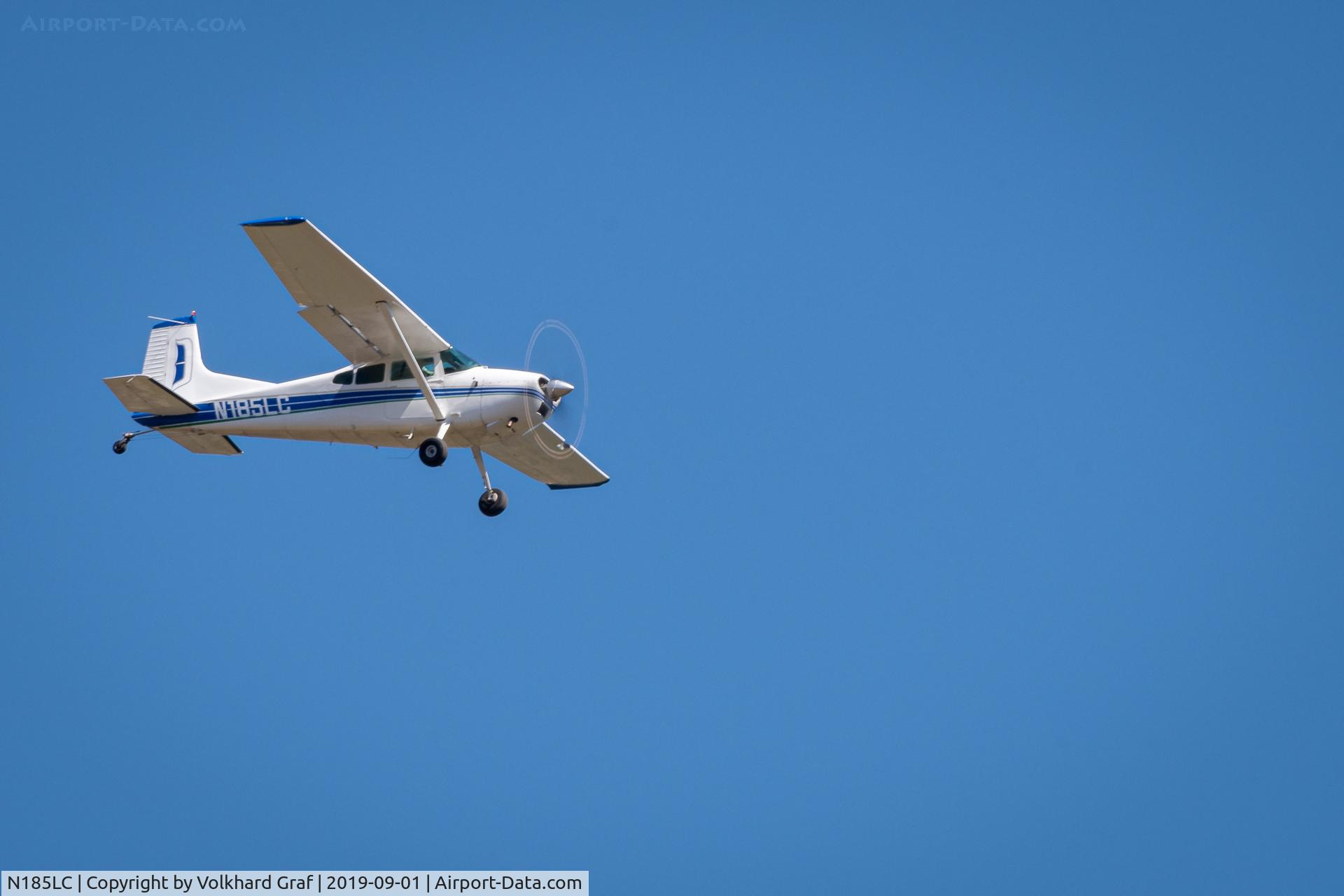 N185LC, Cessna A185E Skywagon 185 C/N 18502014, N185LC on downwind, Rwy. 32, Kamiah Municipal (KS73)