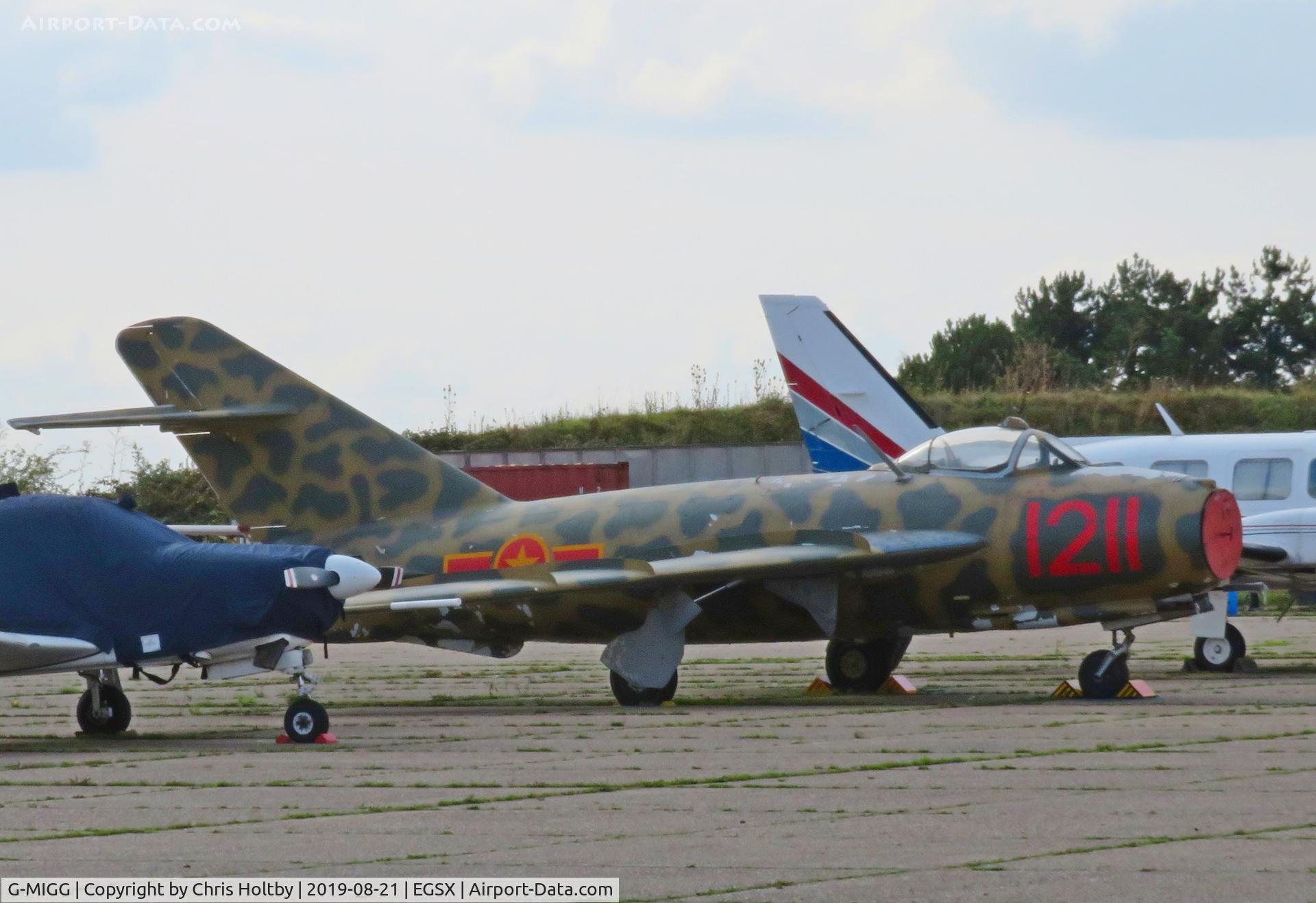 G-MIGG, 1958 PZL-Mielec Lim-5 (MiG-17F) C/N 1C1211, MiG 17 parked at North Weald (ex-G-BWUF)