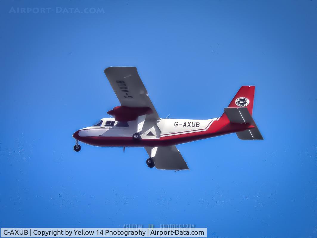 G-AXUB, 1969 Britten-Norman BN-2A Islander C/N 121, '69 Britten-Norman BN-2A Islander with Headcorn Parachute Club roundel photographed over Blackheath, London.