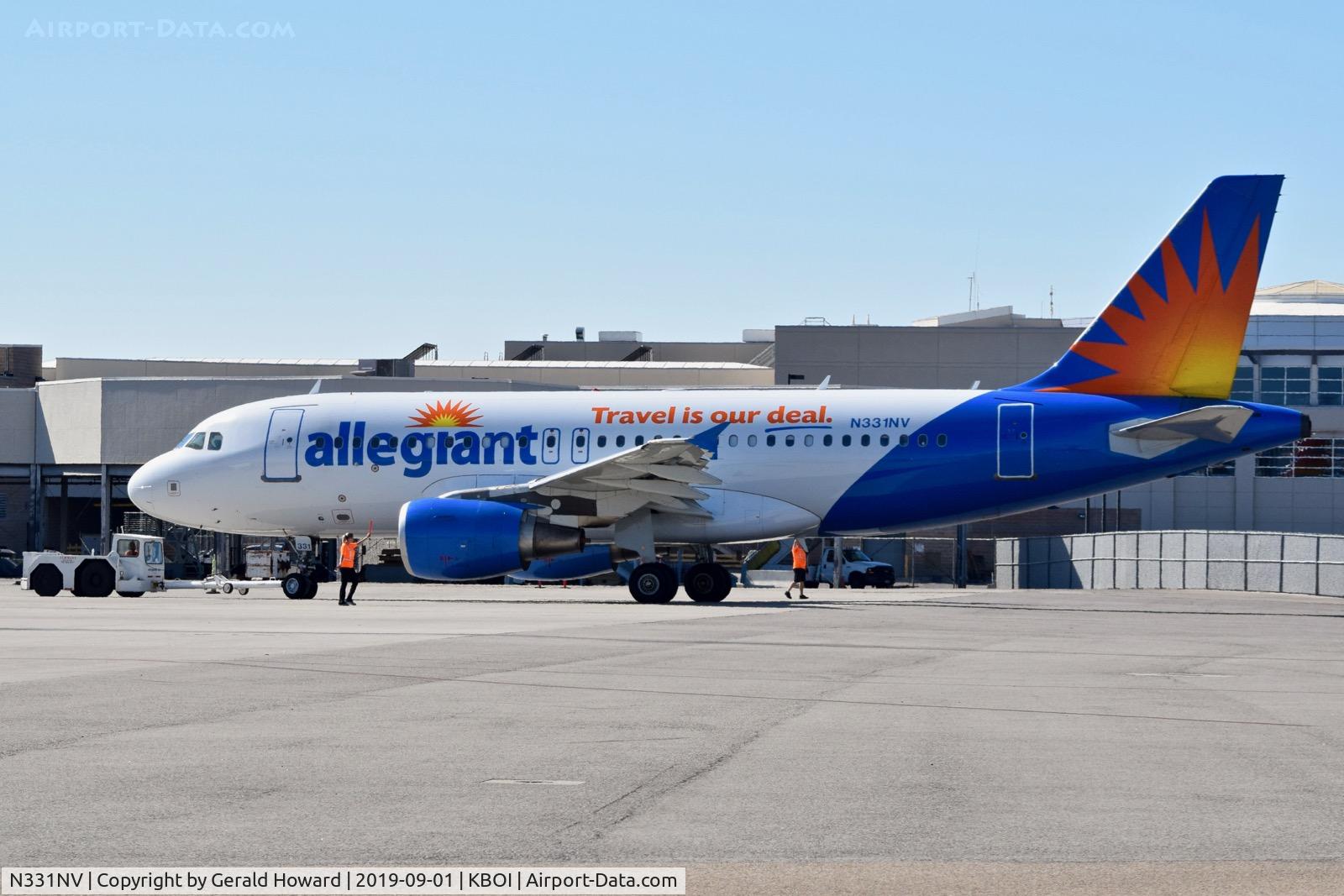 N331NV, 2005 Airbus A319-112 C/N 2625, Push back from the gate.