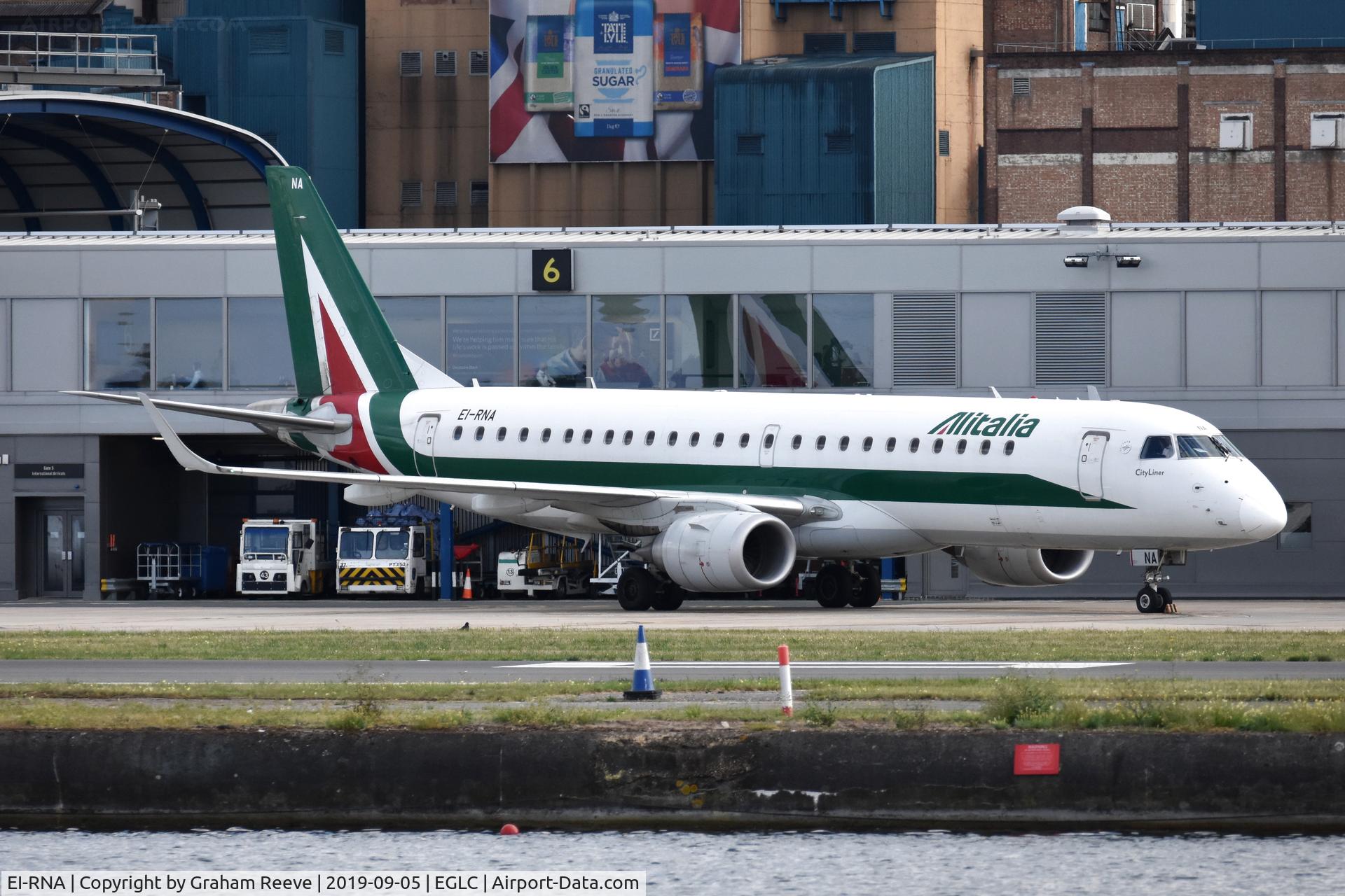 EI-RNA, 2011 Embraer 190LR (ERJ-190-100LR) C/N 19000470, Parked at London City Airport.