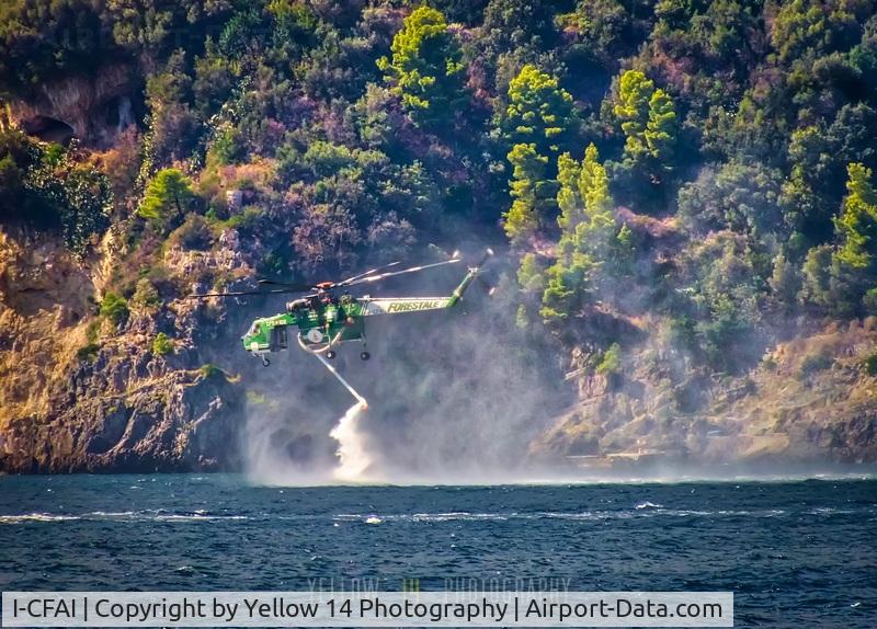 I-CFAI, 1969 Sikorsky S-64F Skycrane C/N 64-067, s64-F of Corpo Forestale dello Stato taking in water whilst fighting a wildfire above Amalfi.