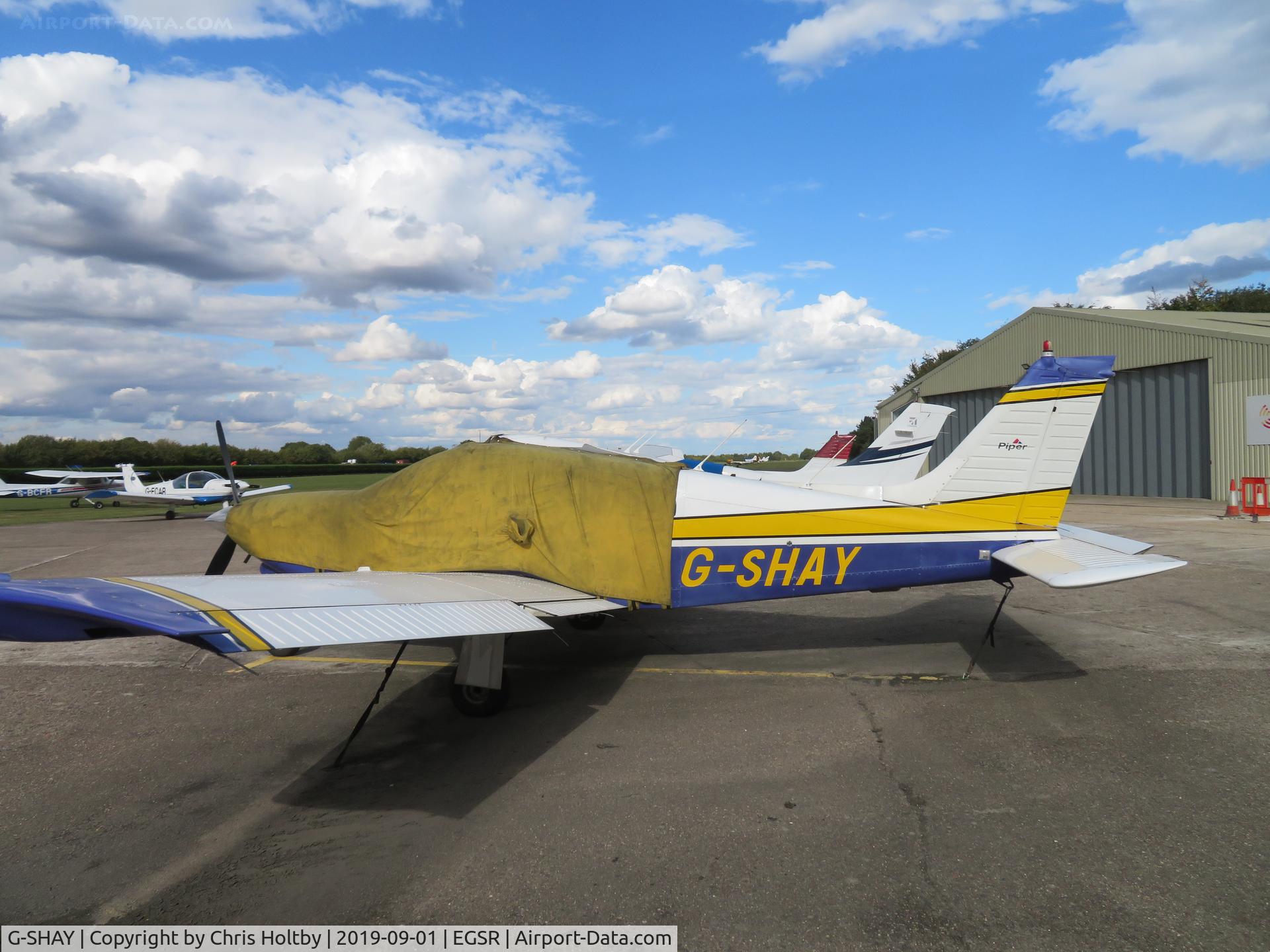 G-SHAY, 1977 Piper PA-28R-201T Cherokee Arrow III C/N 28R-7703365, Parked and covered at Earl's Colne
