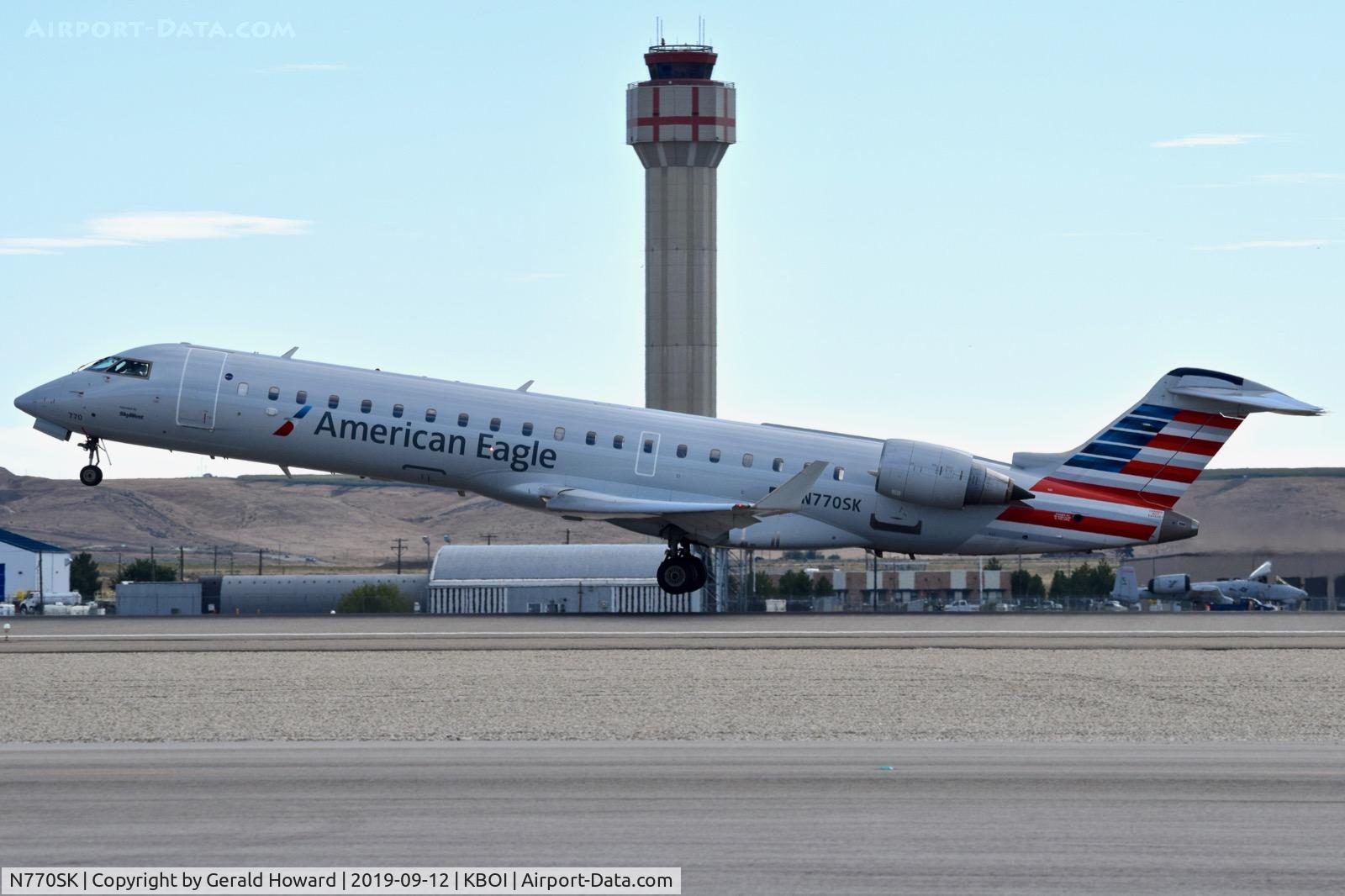 N770SK, 2006 Canadair CL-600-2C10 Regional Jet CRJ-700 C/N 10243, Takeoff from RWY 10L.