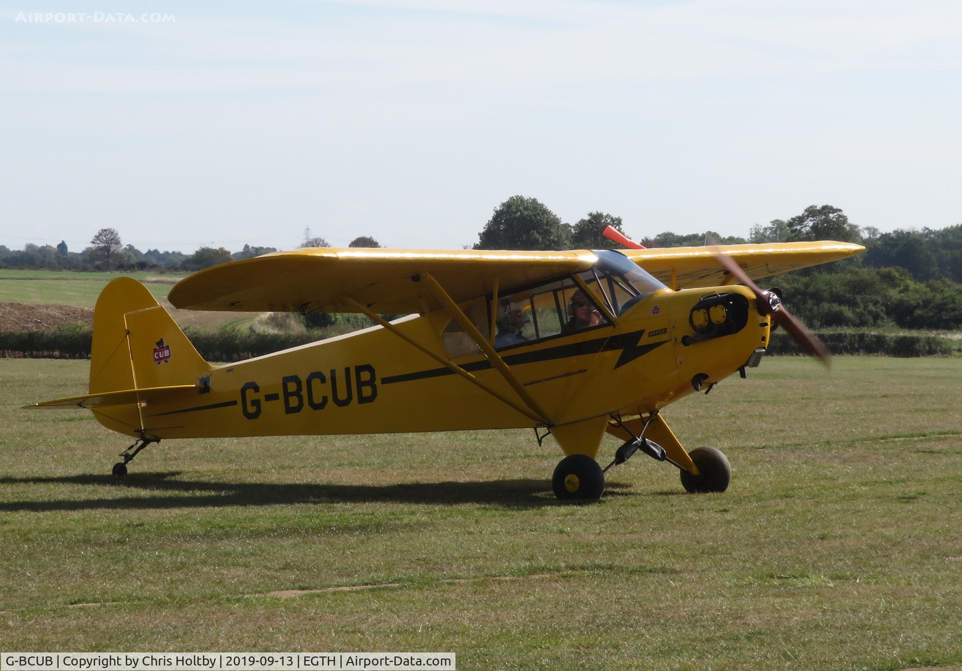 G-BCUB, 1943 Piper J3C-65 Cub (Lippert Reed Conversion) Cub C/N 13186, Taxiing to park at Old Warden