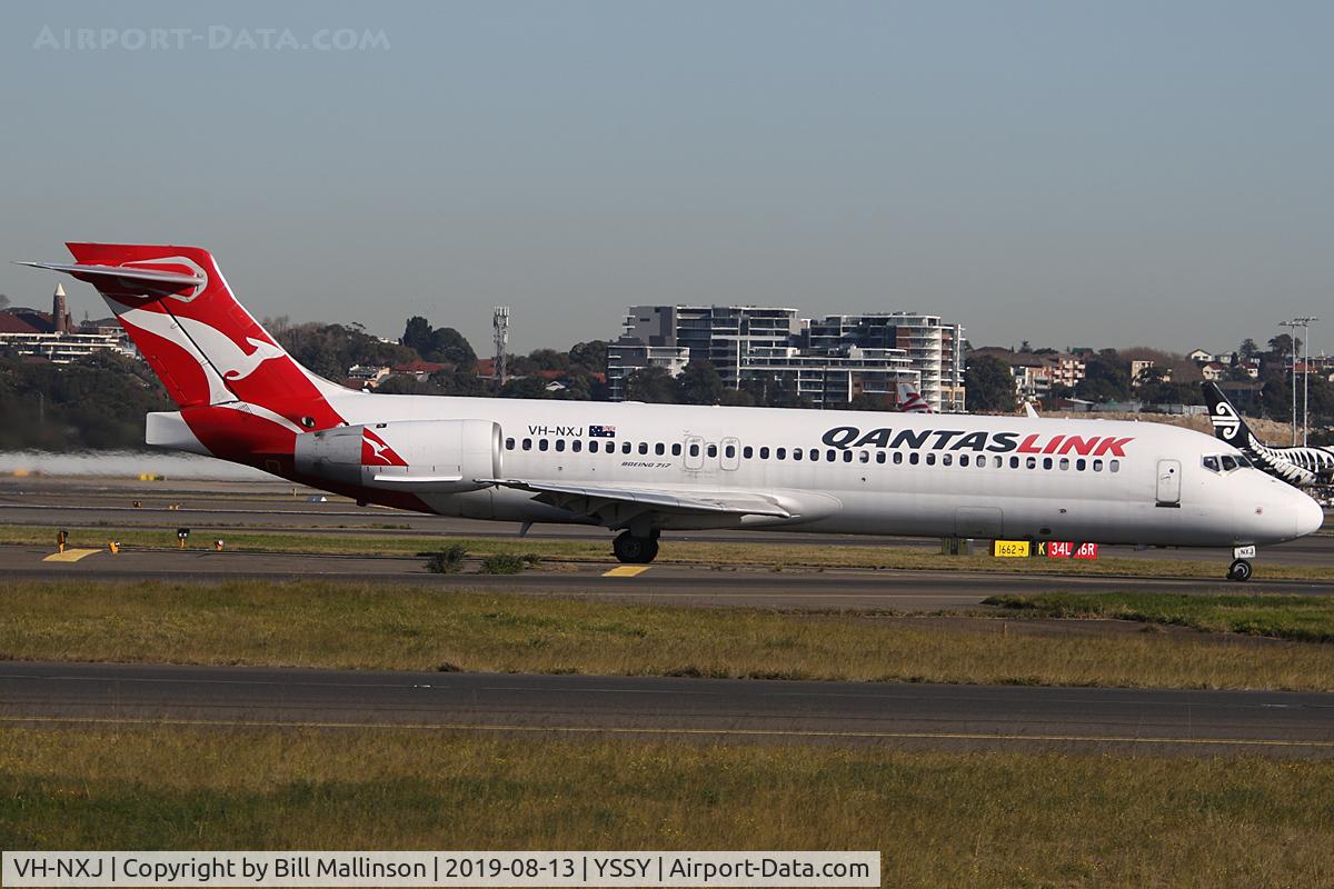 VH-NXJ, 2003 Boeing 717-200 C/N 55166, taxi from 3-4R
