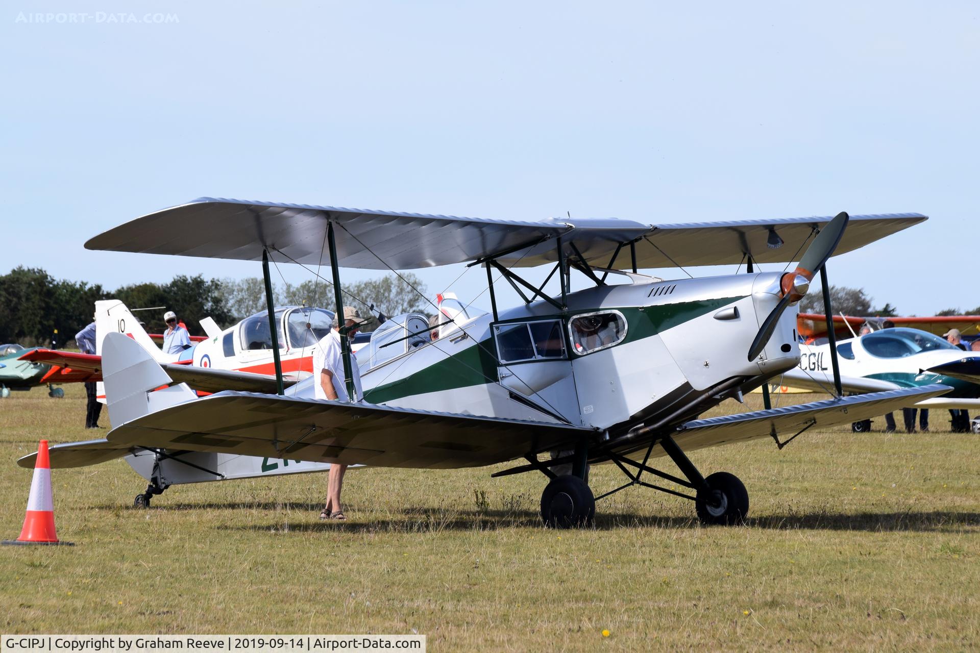 G-CIPJ, 1938 De Havilland DH.83 Fox Moth C/N TS2810, Parked at, Bury St Edmunds, Rougham Airfield, UK.