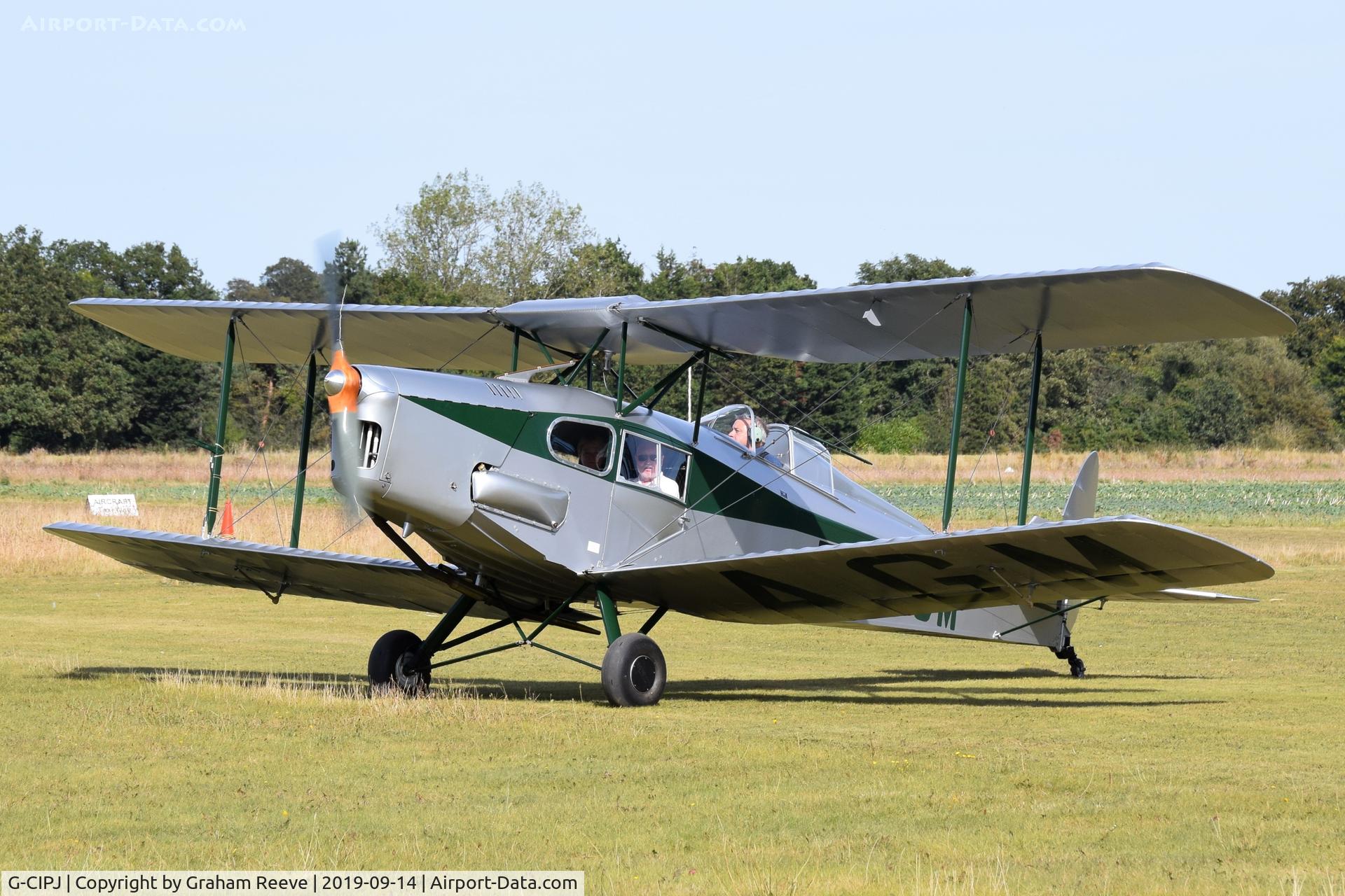 G-CIPJ, 1938 De Havilland DH.83 Fox Moth C/N TS2810, Just landed at, Bury St Edmunds, Rougham Airfield, UK.