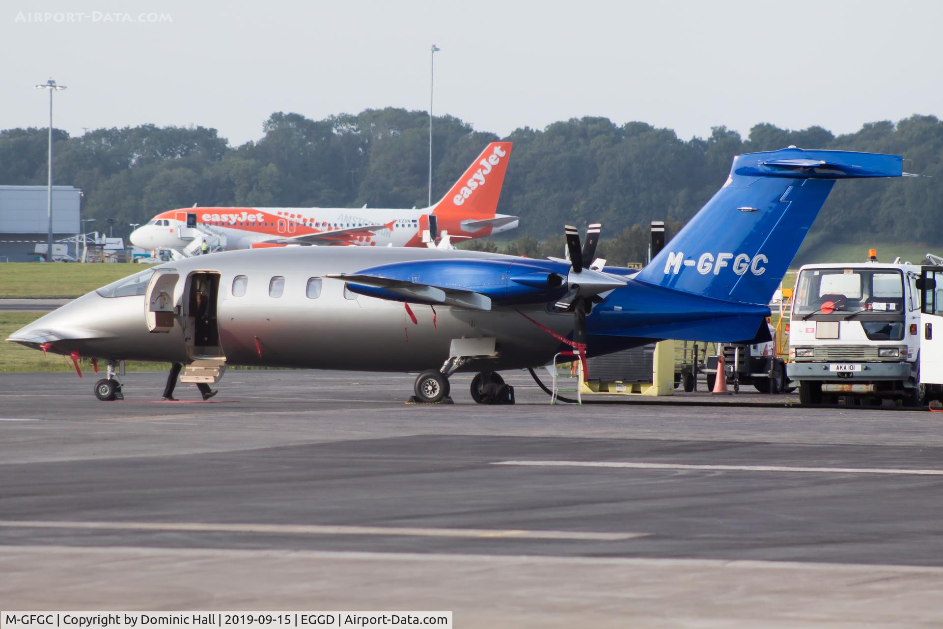 M-GFGC, 2012 Piaggio P-180 Avanti II C/N 1231, Parked on the southside apron