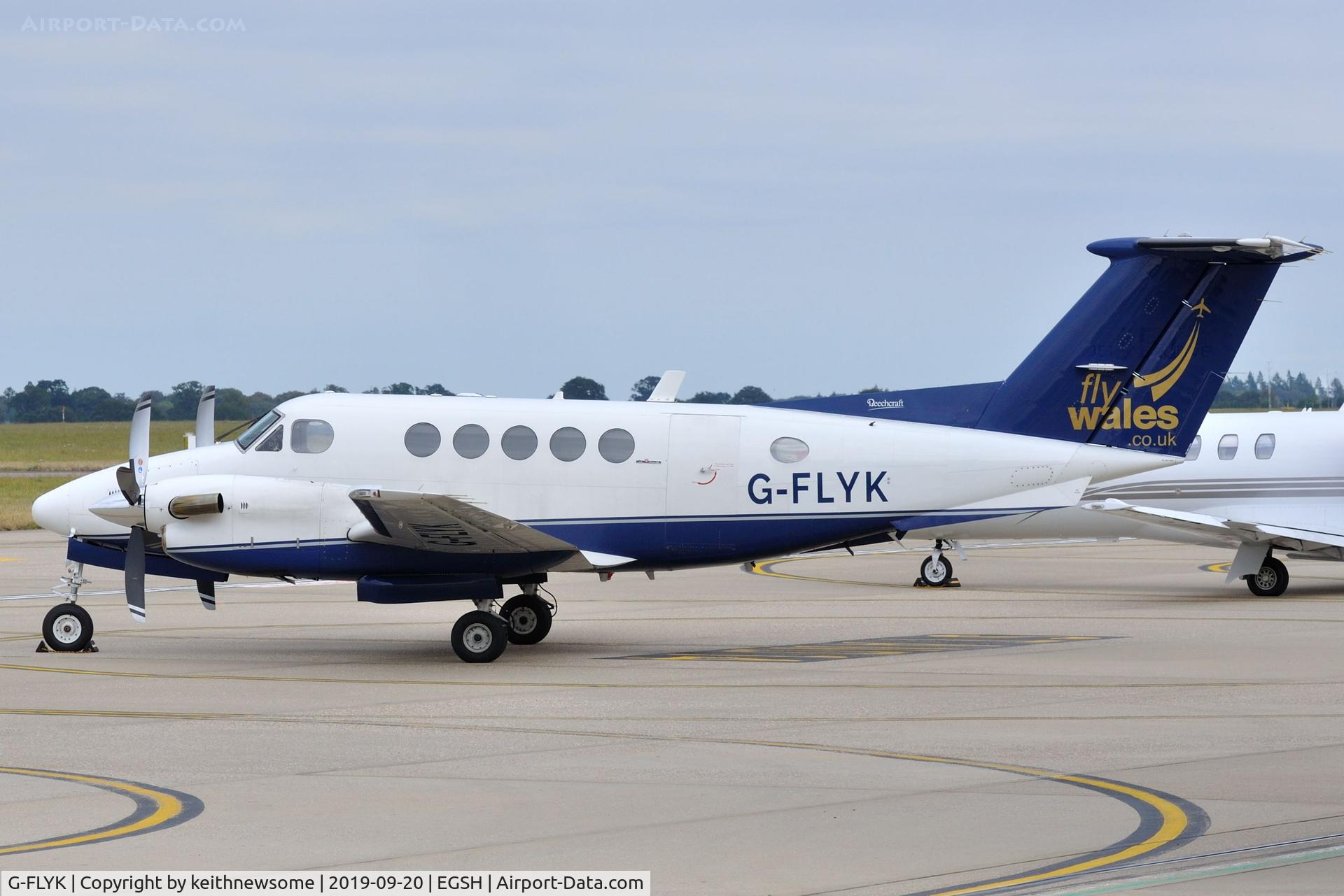 G-FLYK, 1981 Beech B200 King Air King Air C/N BB-921, Parked in the sun.