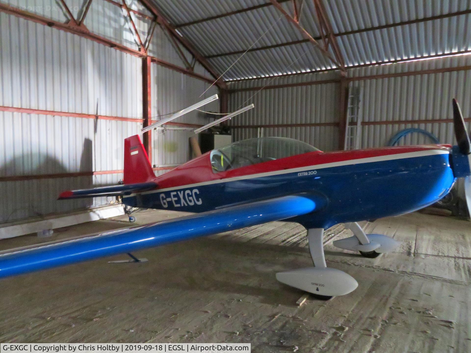 G-EXGC, 1999 Extra EA-300/200 C/N 027, 1999 Extra in the hangar at Andrewsfield