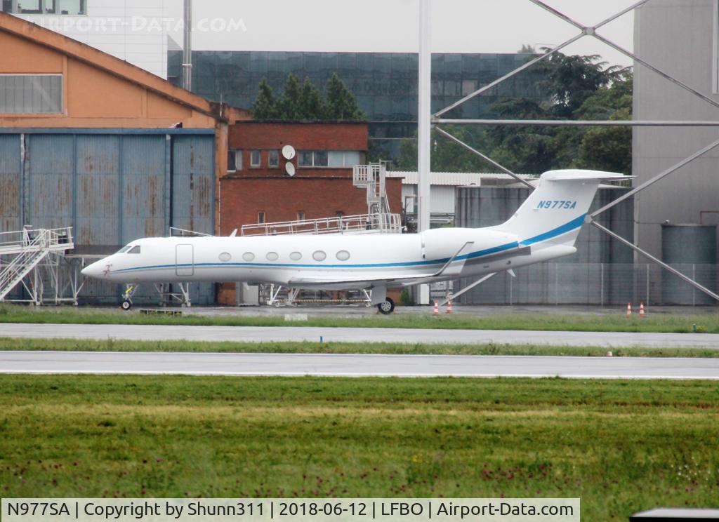 N977SA, 2000 Gulfstream Aerospace G-V C/N 593, Parked at the General Aviation area...