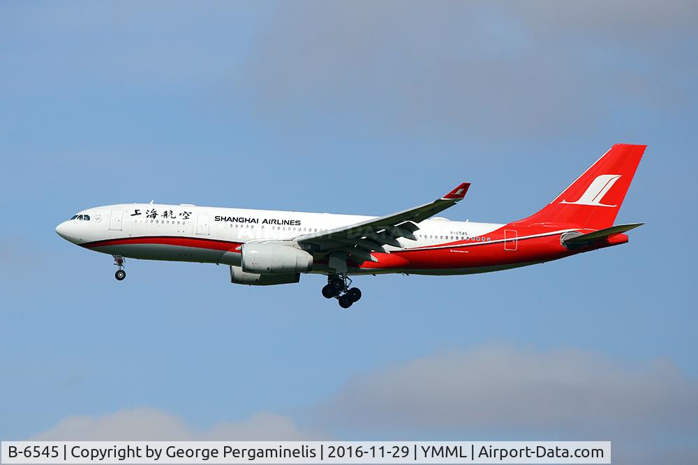 B-6545, 2011 Airbus A330-243 C/N 1291, On final for runway 16.