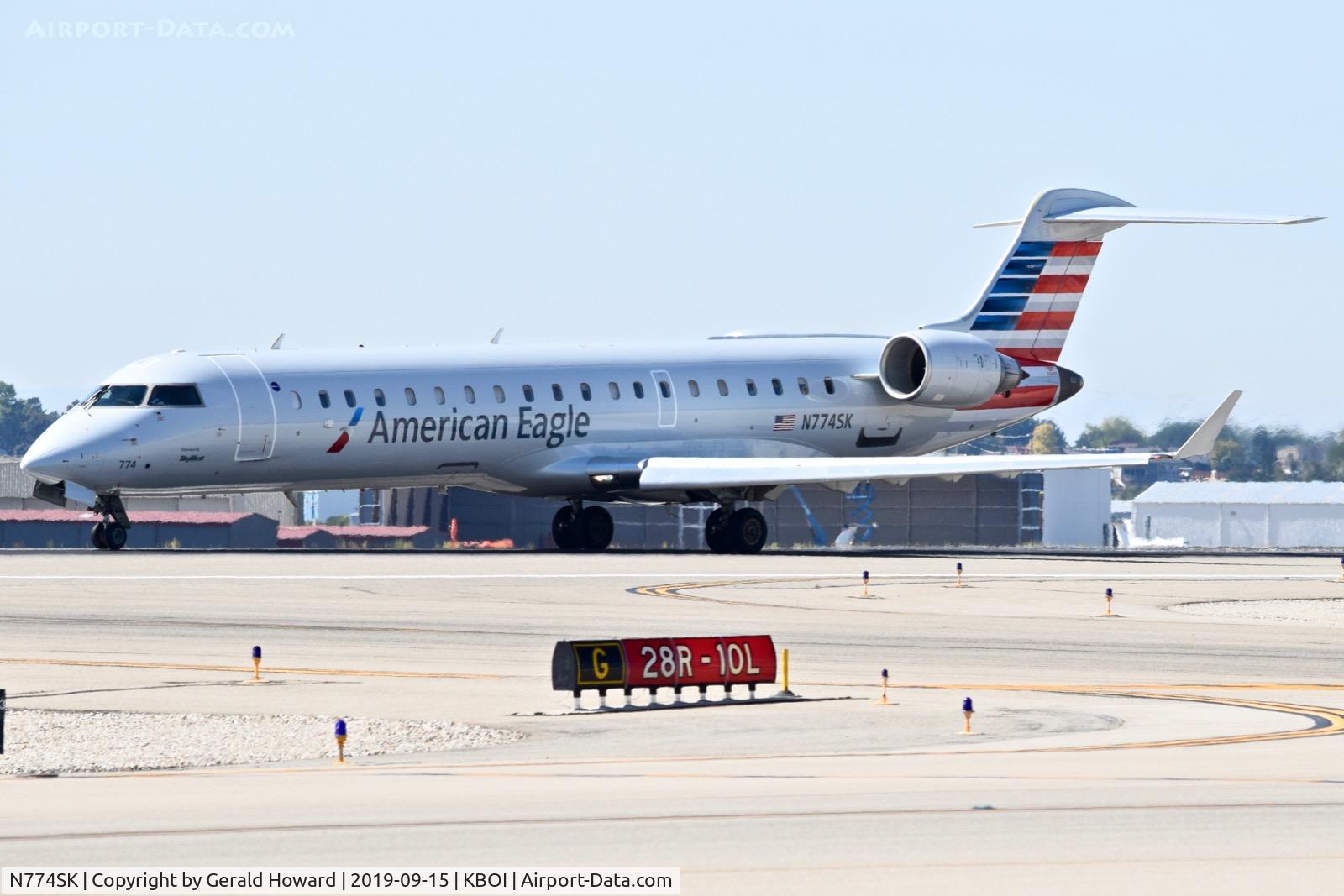 N774SK, 2006 Canadair CL-600-2C10 Regional Jet CRJ-700 C/N 10240, Take off run on RWY 10L.