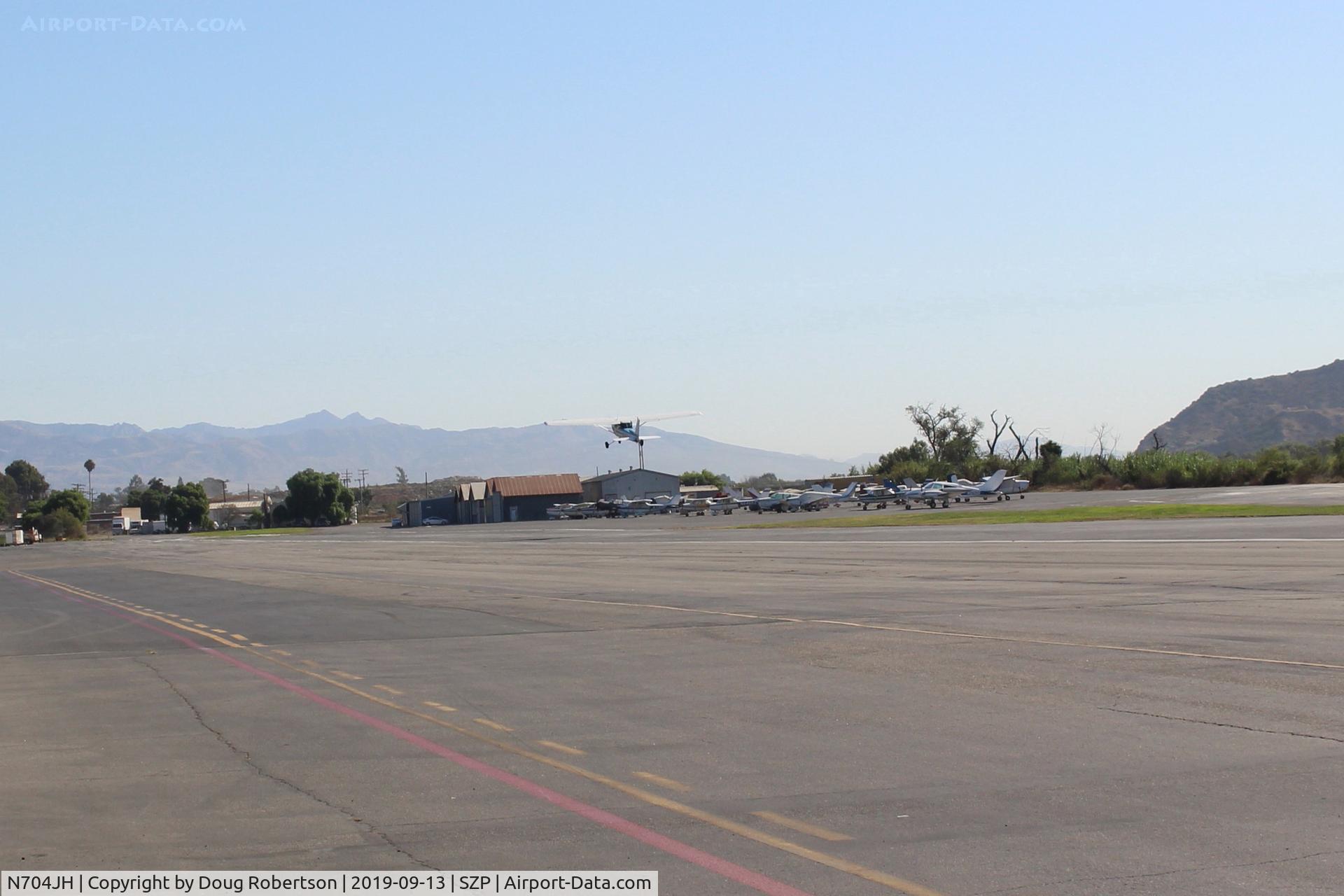 N704JH, 1976 Cessna 150M C/N 15078644, 1976 Cessna 150M, Continental 0-200 100 Hp, takeoff climb Rwy 04