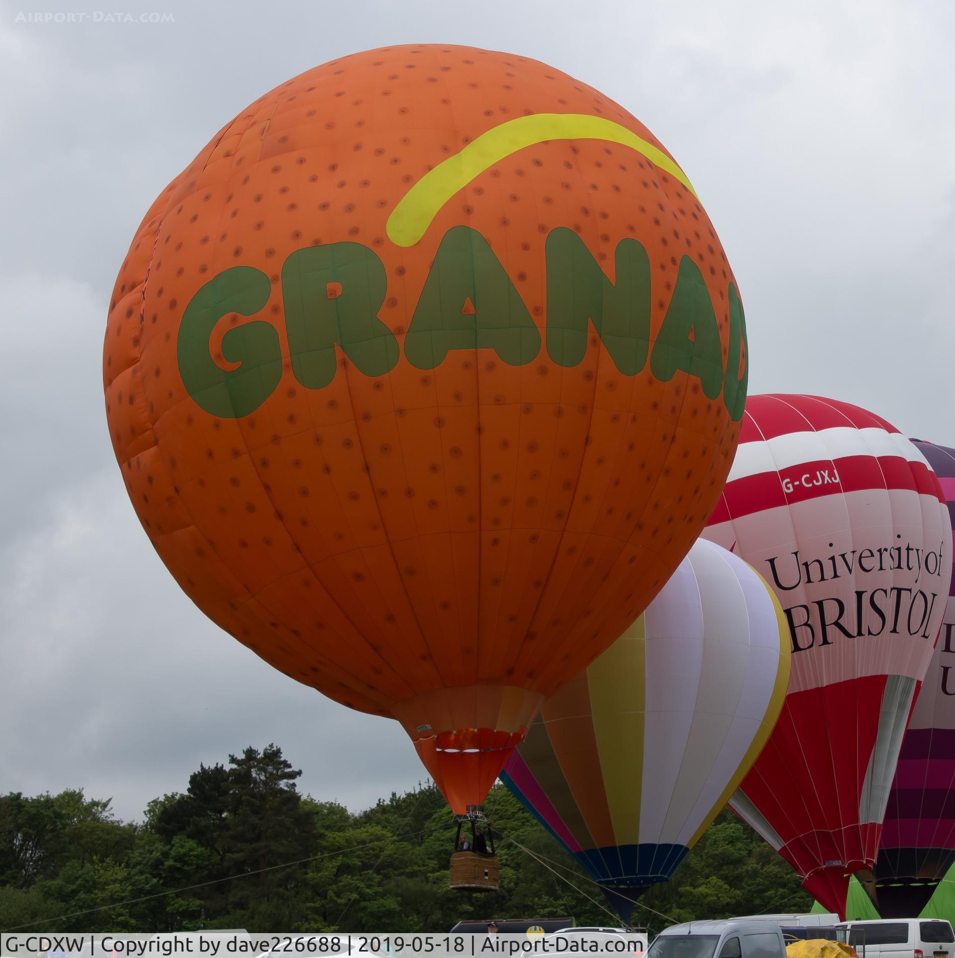 G-CDXW, 1993 Cameron Balloons Ltd CAMERON ORANGE-120 C/N 2947, Andrew Kaye displays his Granador themed Orange Balloon at the midland Air festival  - Nuneaton