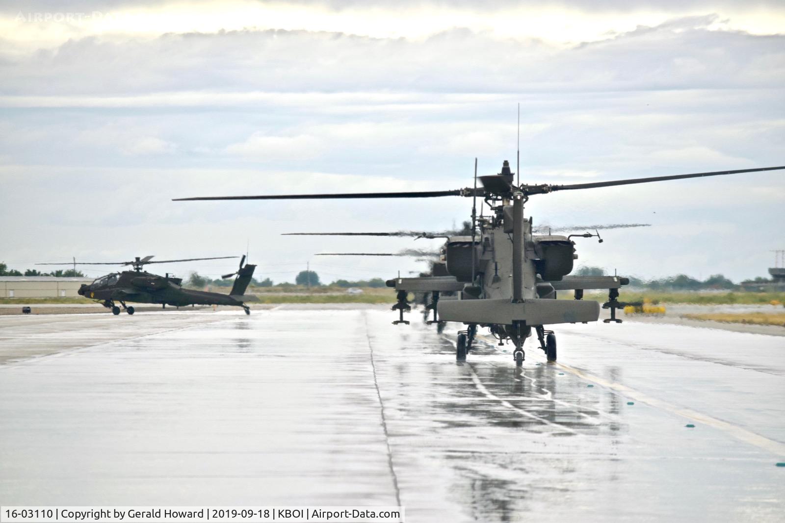 16-03110, 2016 Boeing AH-64E Apache Guardian C/N MM110, Taxiing Bravo behind 3 other AH-64Es.