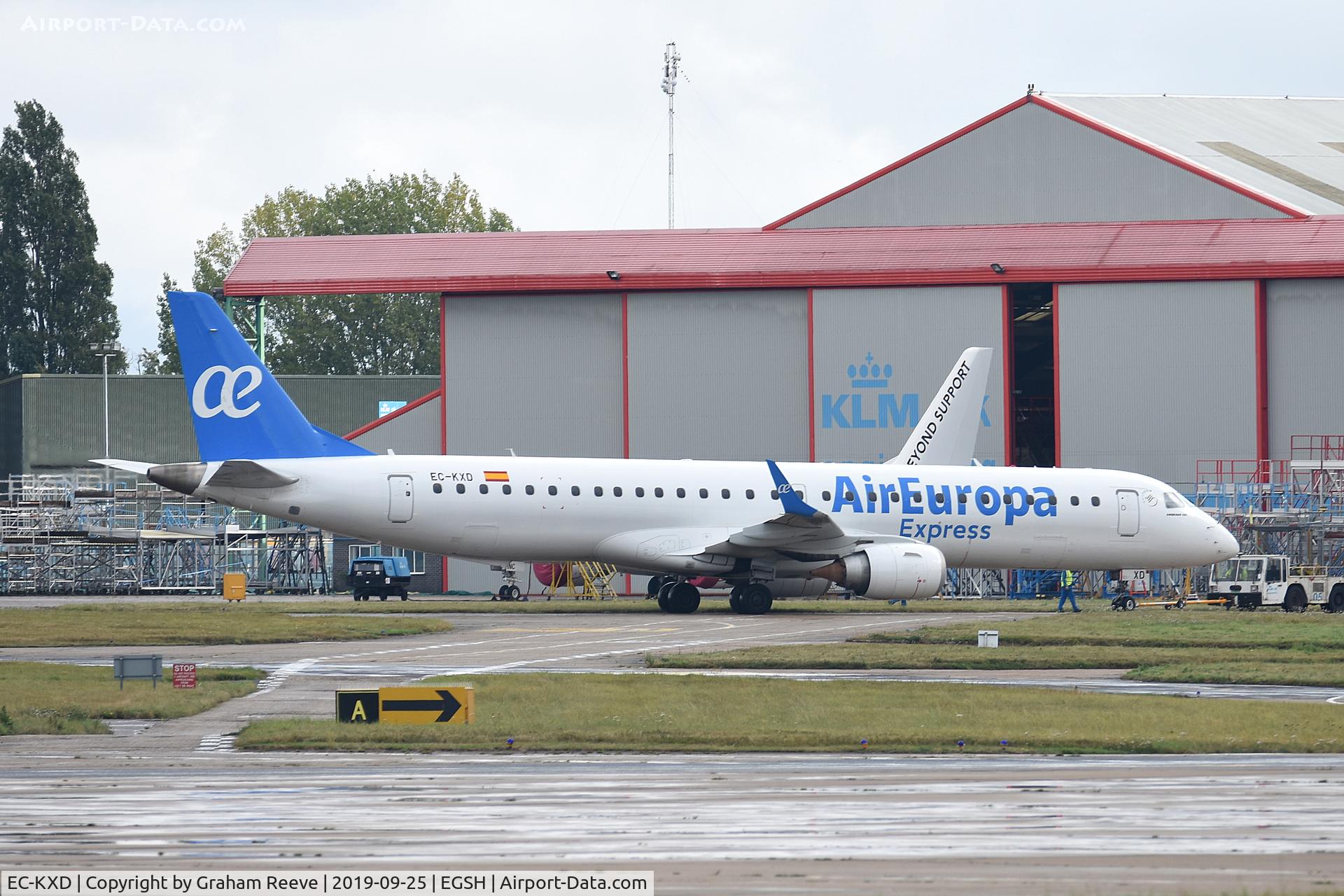 EC-KXD, 2009 Embraer 195LR (ERJ-190-200LR) C/N 19000244, Under tow at Norwich.