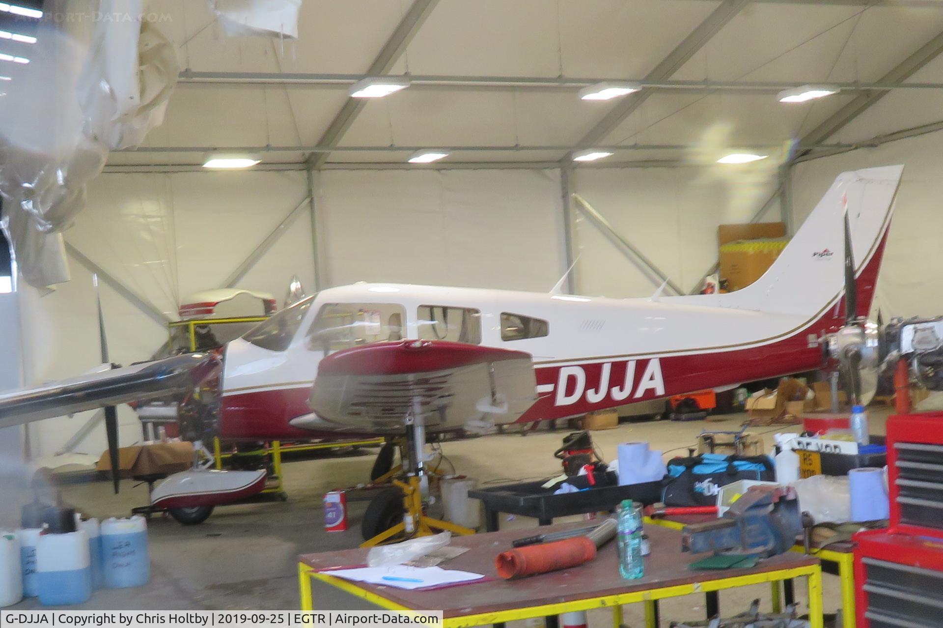 G-DJJA, 1984 Piper PA-28-181 Cherokee Archer II C/N 28-8490014, In the maintenance hangar at Elstree