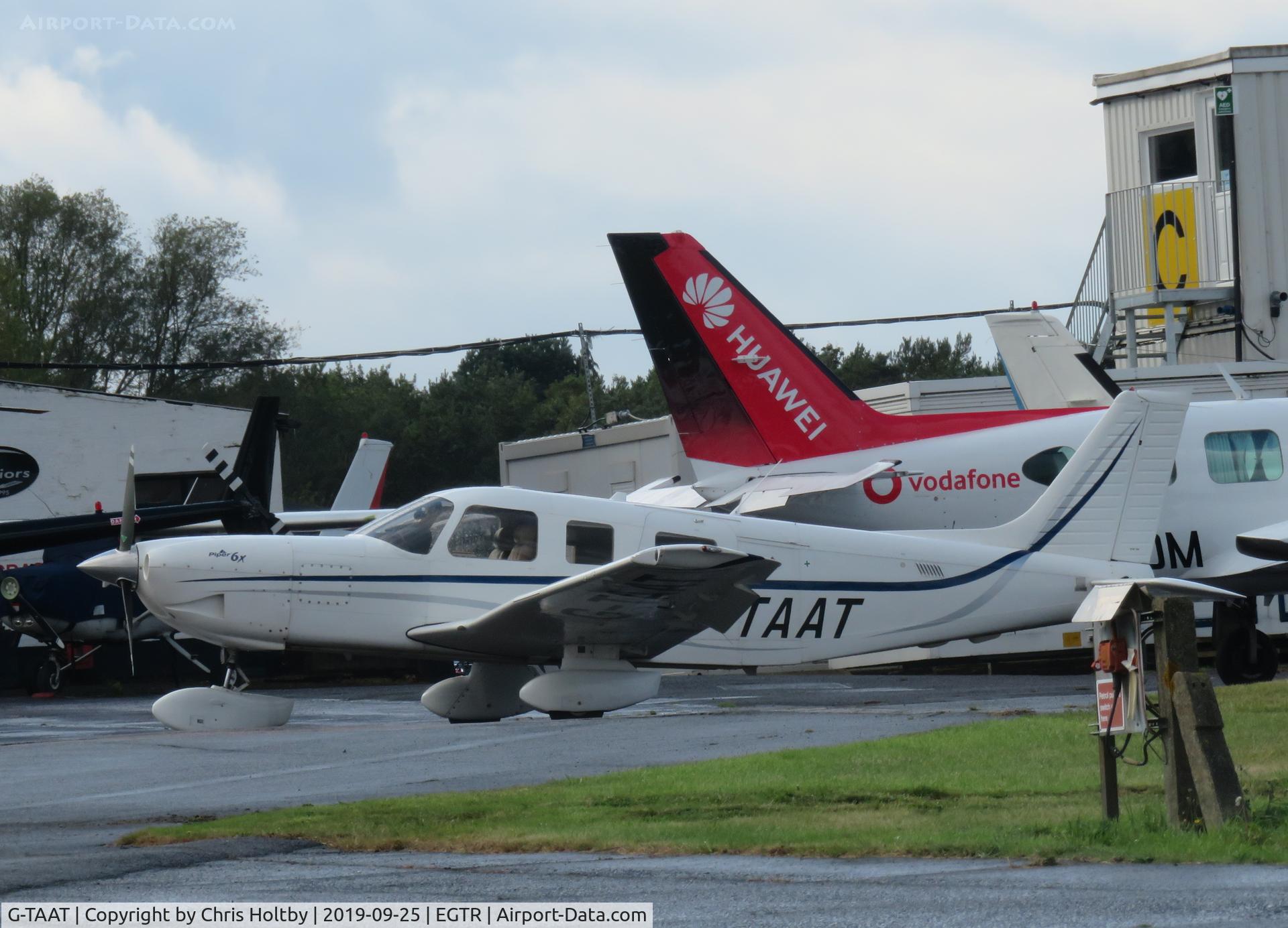 G-TAAT, 2004 Piper PA-32-301FT 6X Saratoga Saratoga C/N 3232027, Saratoga parked at Elstree