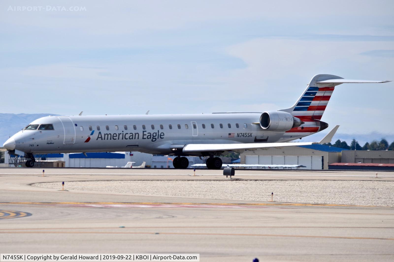 N745SK, 2005 Bombardier CRJ-701ER (CL-600-2C10) Regional Jet C/N 10201, Take off run on RWY 10L.