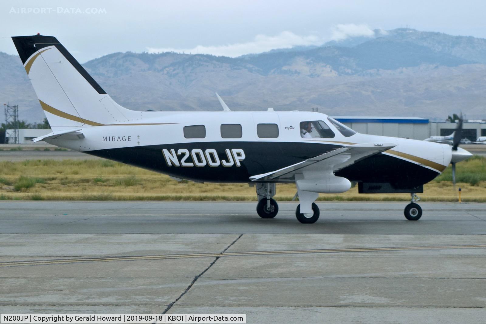 N200JP, 2014 Piper PA-46-350P Malibu Mirage C/N 4636649, Taxiing on Bravo.
