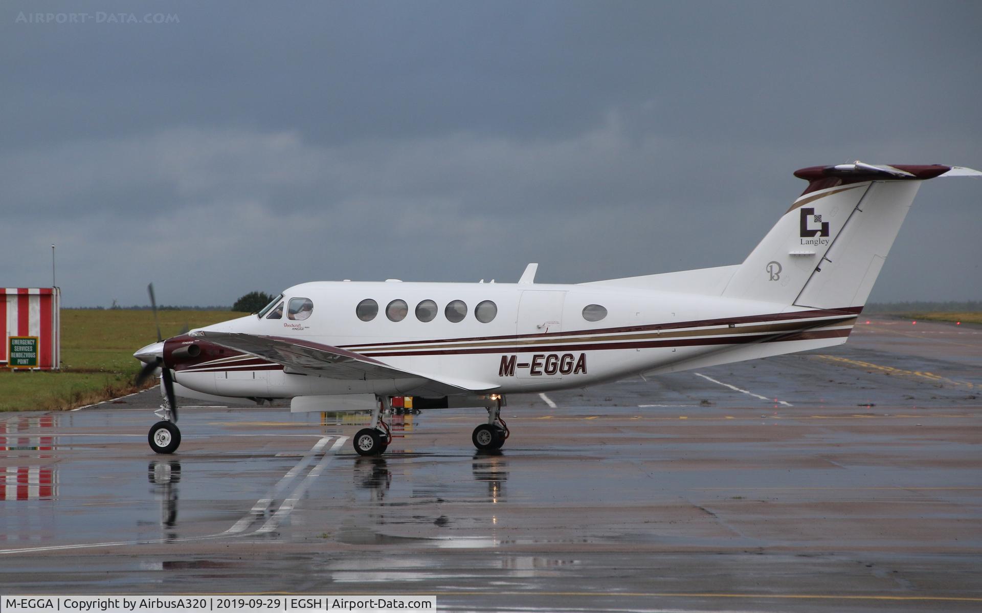 M-EGGA, 2006 Raytheon B200 King Air C/N BB-1933, Arriving during nice summer shower at Norwich