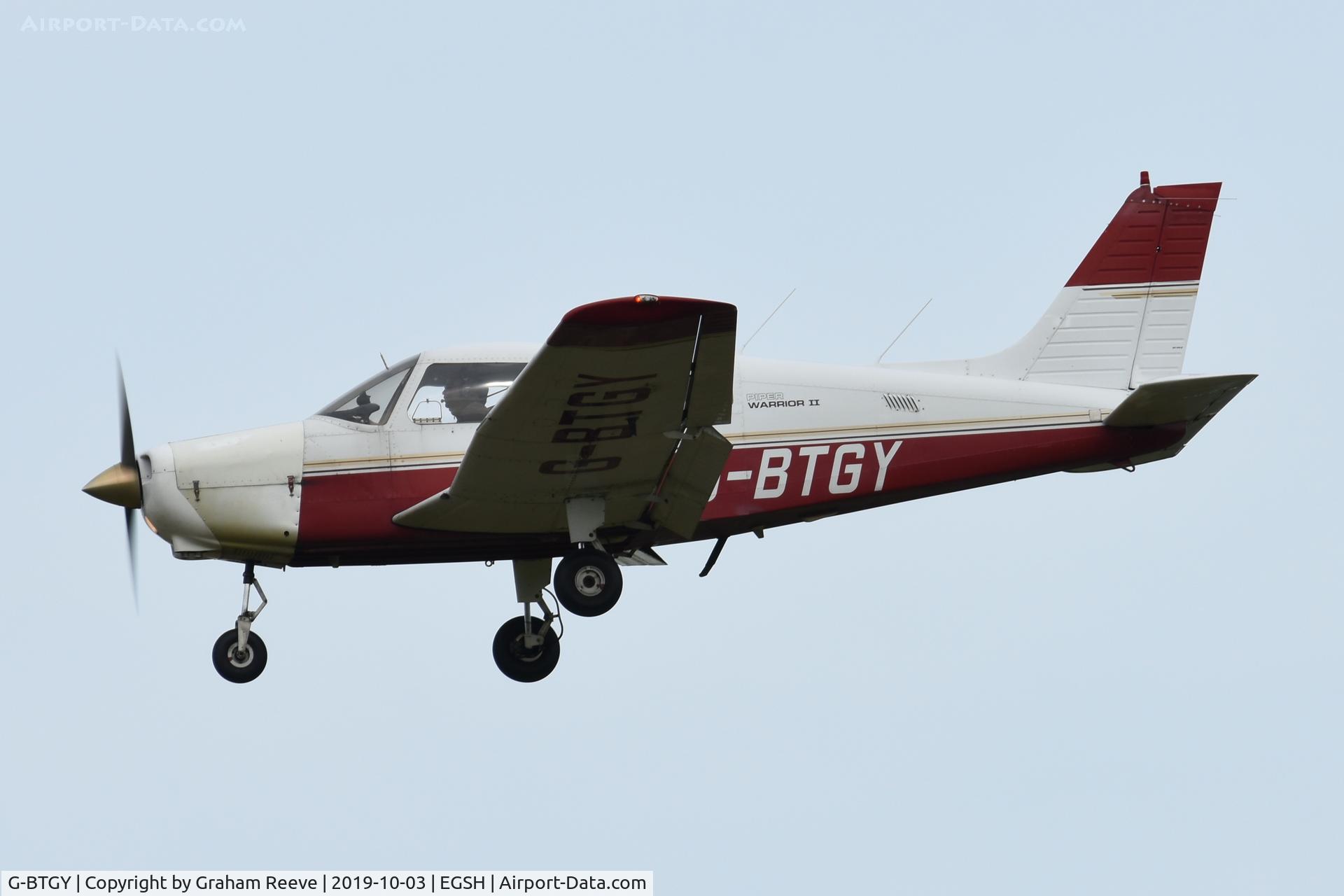 G-BTGY, 1982 Piper PA-28-161 Cherokee Warrior II C/N 28-8216199, Landing at Norwich.