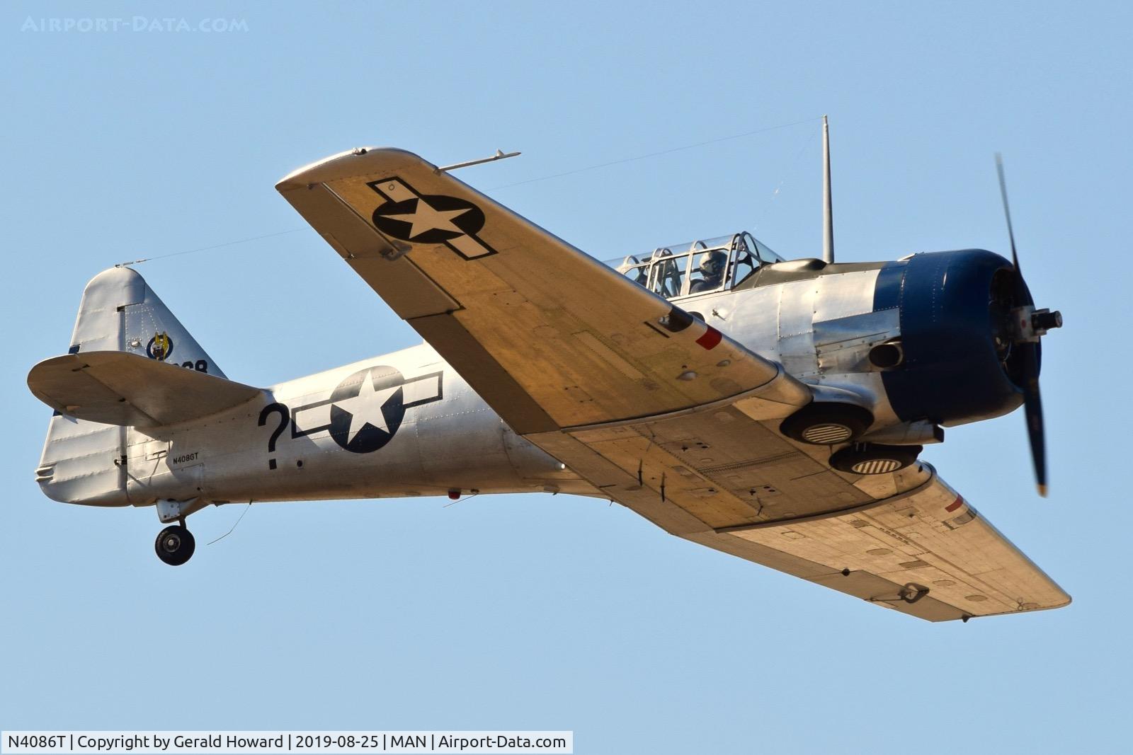 N4086T, North American AT-6D C/N 42-86068, Over flying MAN.