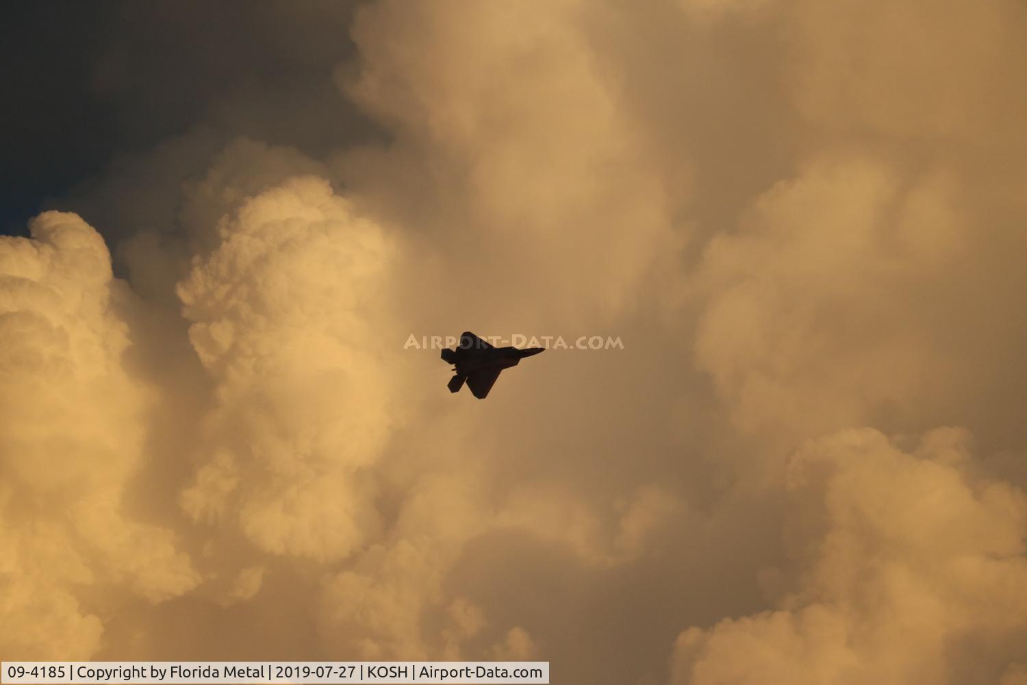 09-4185, Lockheed Martin F-22A Raptor C/N 4185, Air Venture 2019 - with a thunderhead