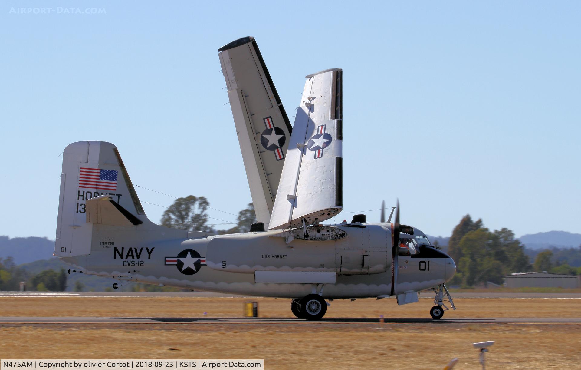 N475AM, Grumman C-1A Trader C/N 34, folding her wings