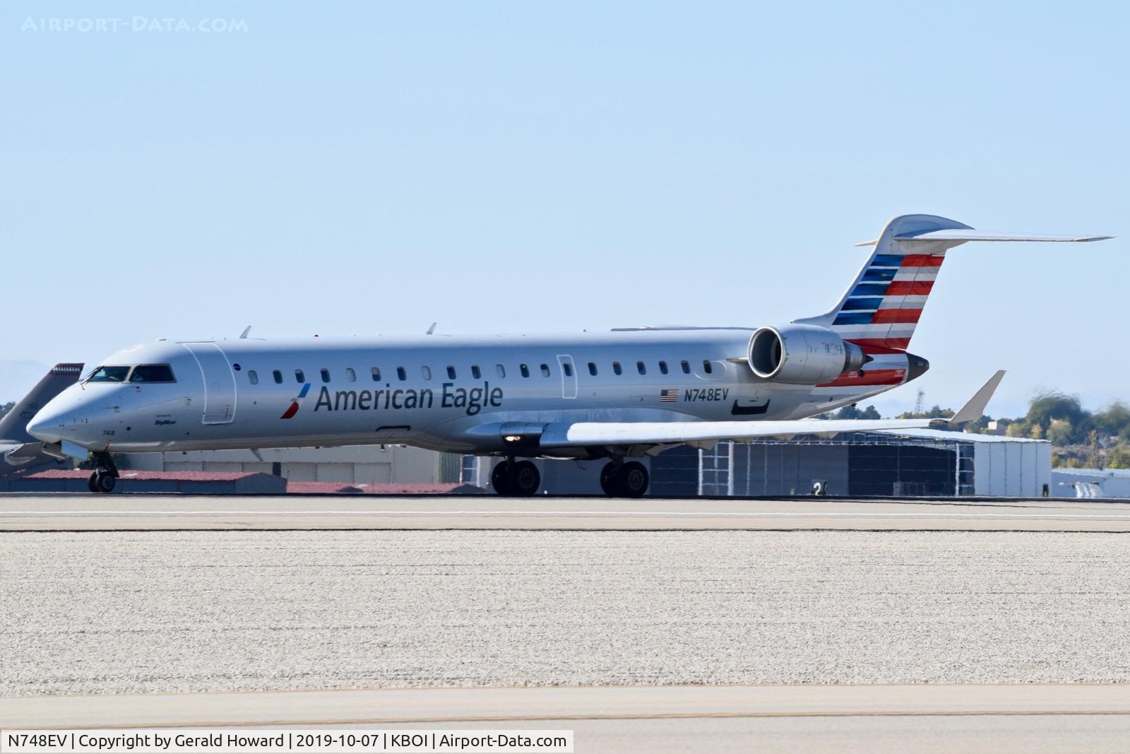 N748EV, 2004 Bombardier CRJ-700 (CL-600-2C10) Regional Jet C/N 10158, Landing on RWY 10L.