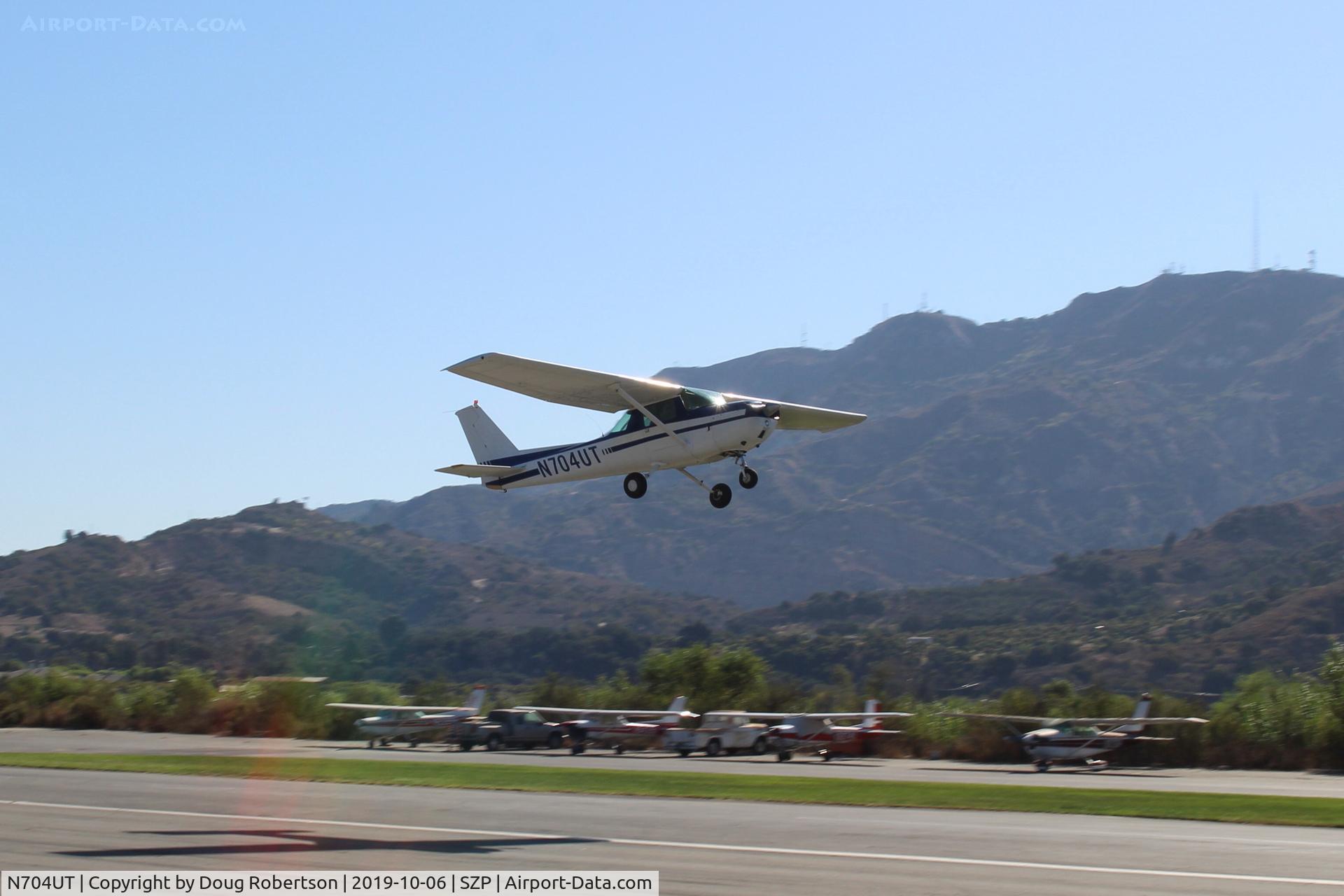 N704UT, 1976 Cessna 150M C/N 15078891, 1976 Cessna 150M, Continental O-200 100 Hp, takeoff climb Rwy 22