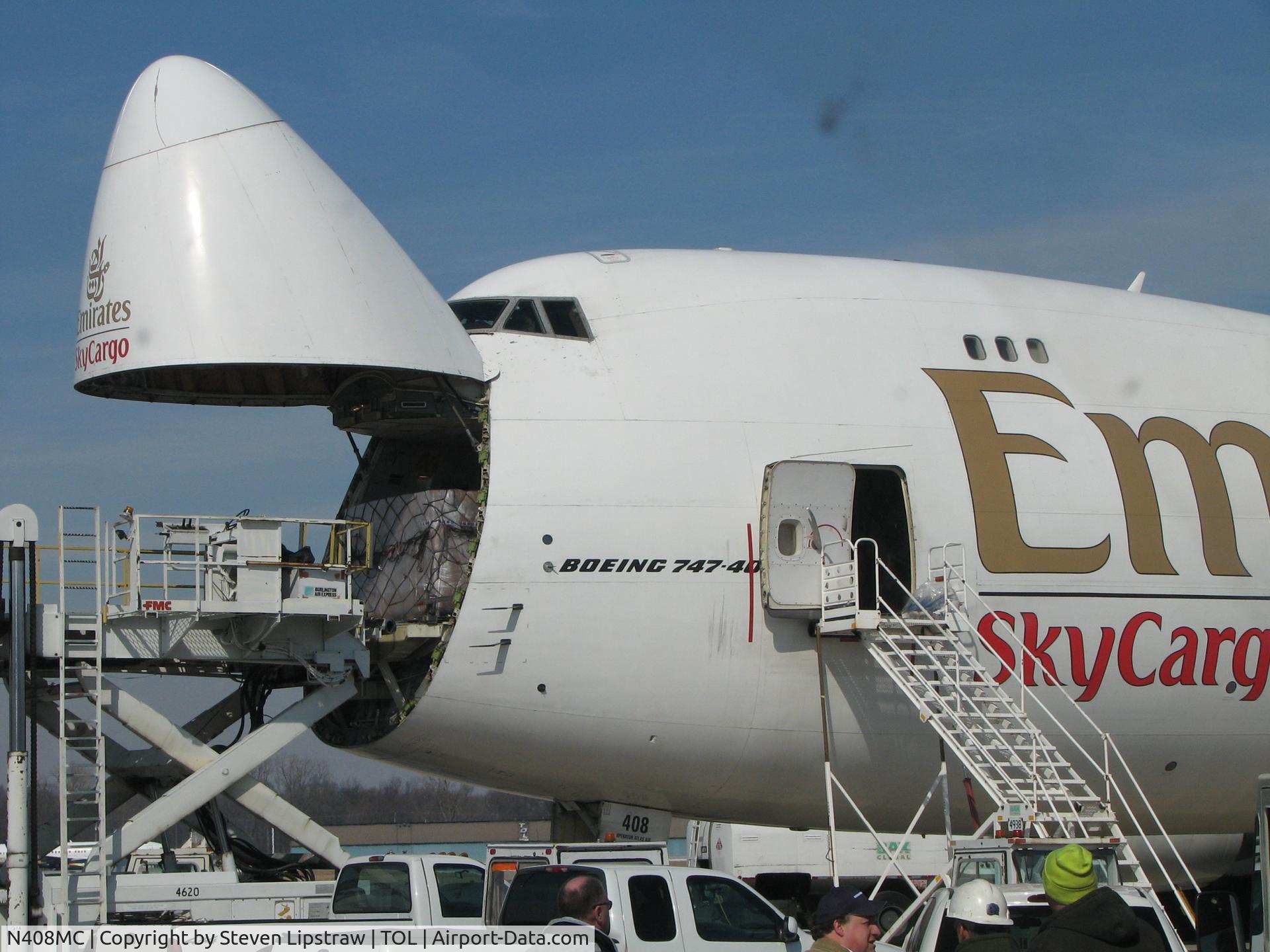 N408MC, 1998 Boeing 747-47UF C/N 29261, Emirates SkyCargo 747-400F (operated by Atlas Airlines) unloading for BAX Global