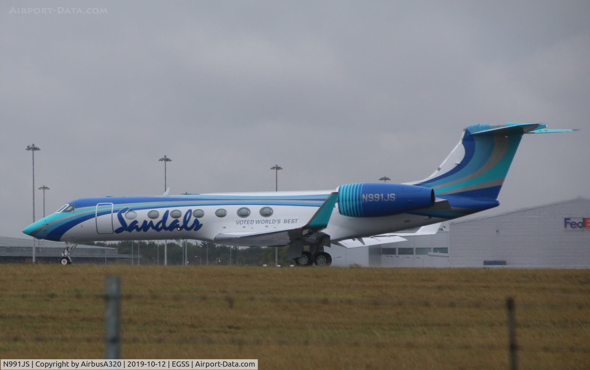 N991JS, 2018 Gulfstream Aerospace GV-SP (G550) C/N 5581, Departing a wet Stansted