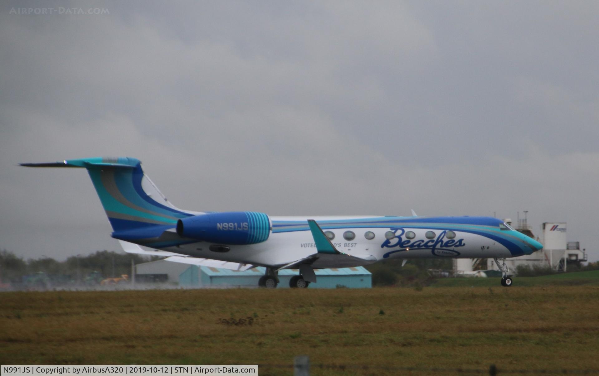 N991JS, 2018 Gulfstream Aerospace GV-SP (G550) C/N 5581, Departing a wet Stansted