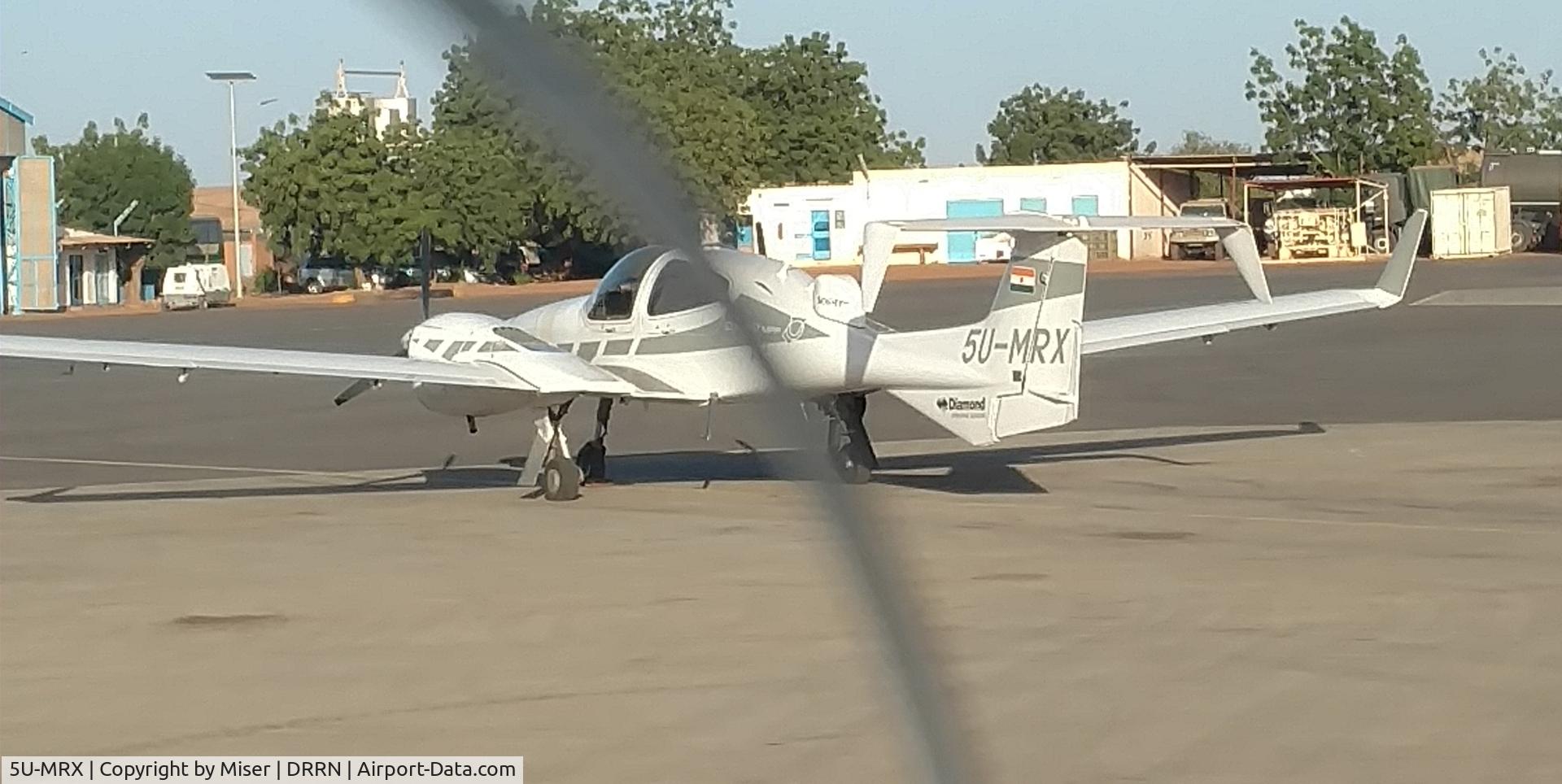 5U-MRX, Diamond DA-42MPP Twin Star C/N 42.304, Sitting at the airport in Niamey