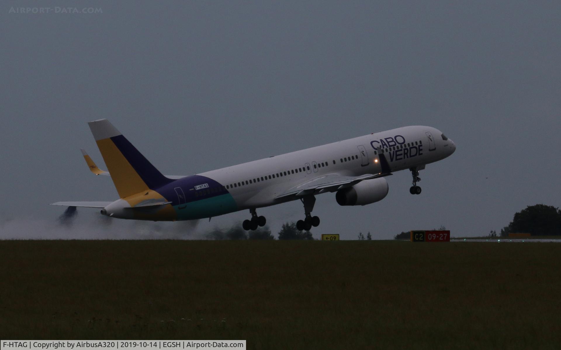F-HTAG, 2000 Boeing 757-256 C/N 29307, Departing a wet Rwy 09