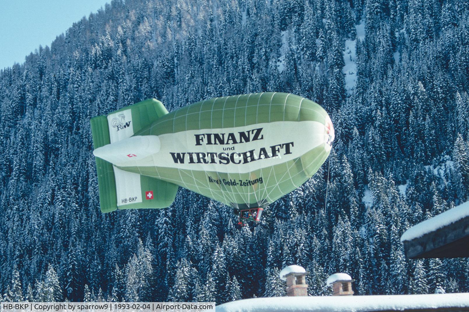HB-BKP, 1987 Cameron Balloons Ltd CAMERON DP-70 C/N 1590, Leaving Davos after the World Economic Forum. Scanned from a slide.