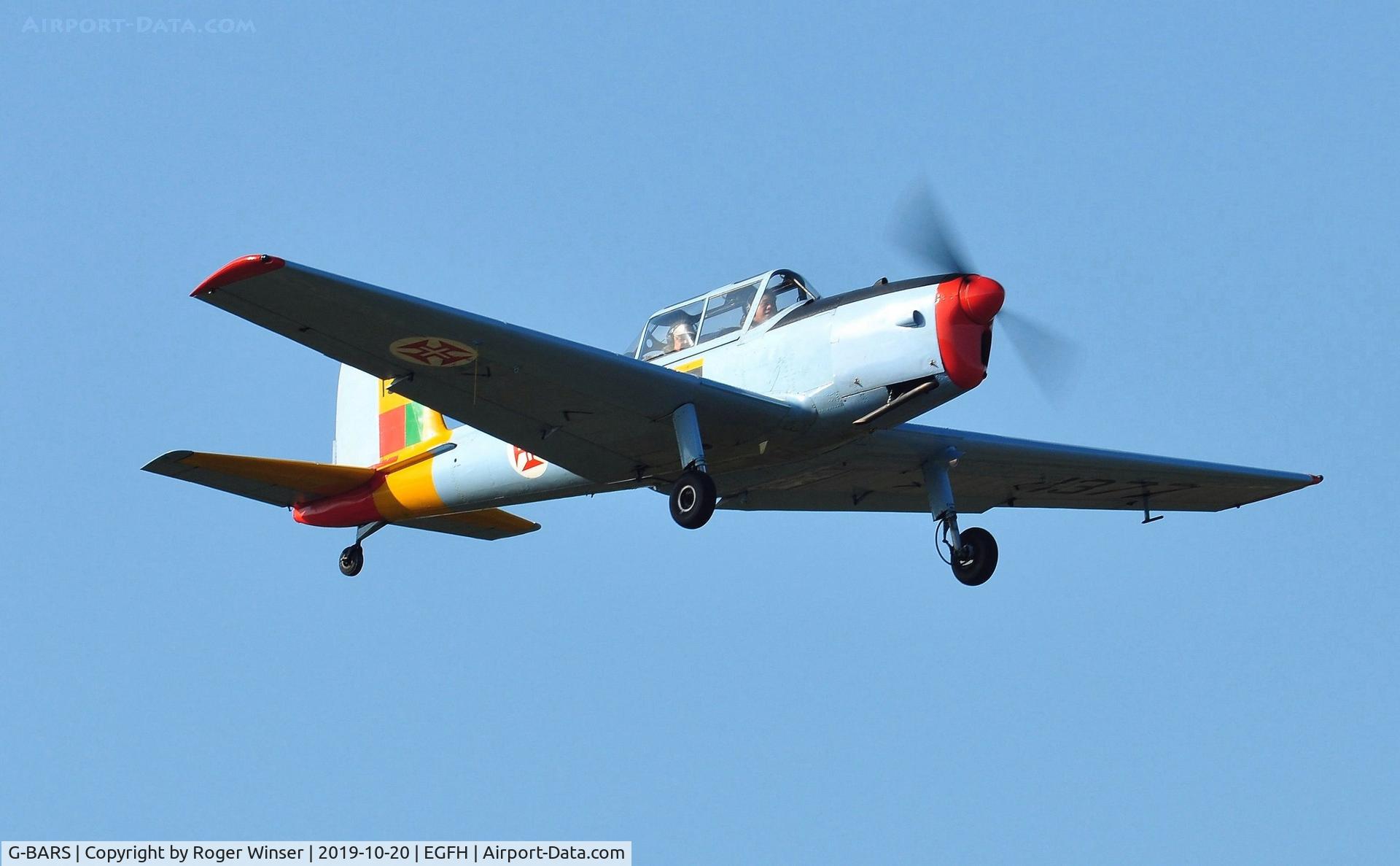 G-BARS, 1952 De Havilland DHC-1 Chipmunk T.10 C/N C1/0557, Visiting Chipmunk in Portuguese Air Force markings over Runway 04. Previously WK520 in RAF service.