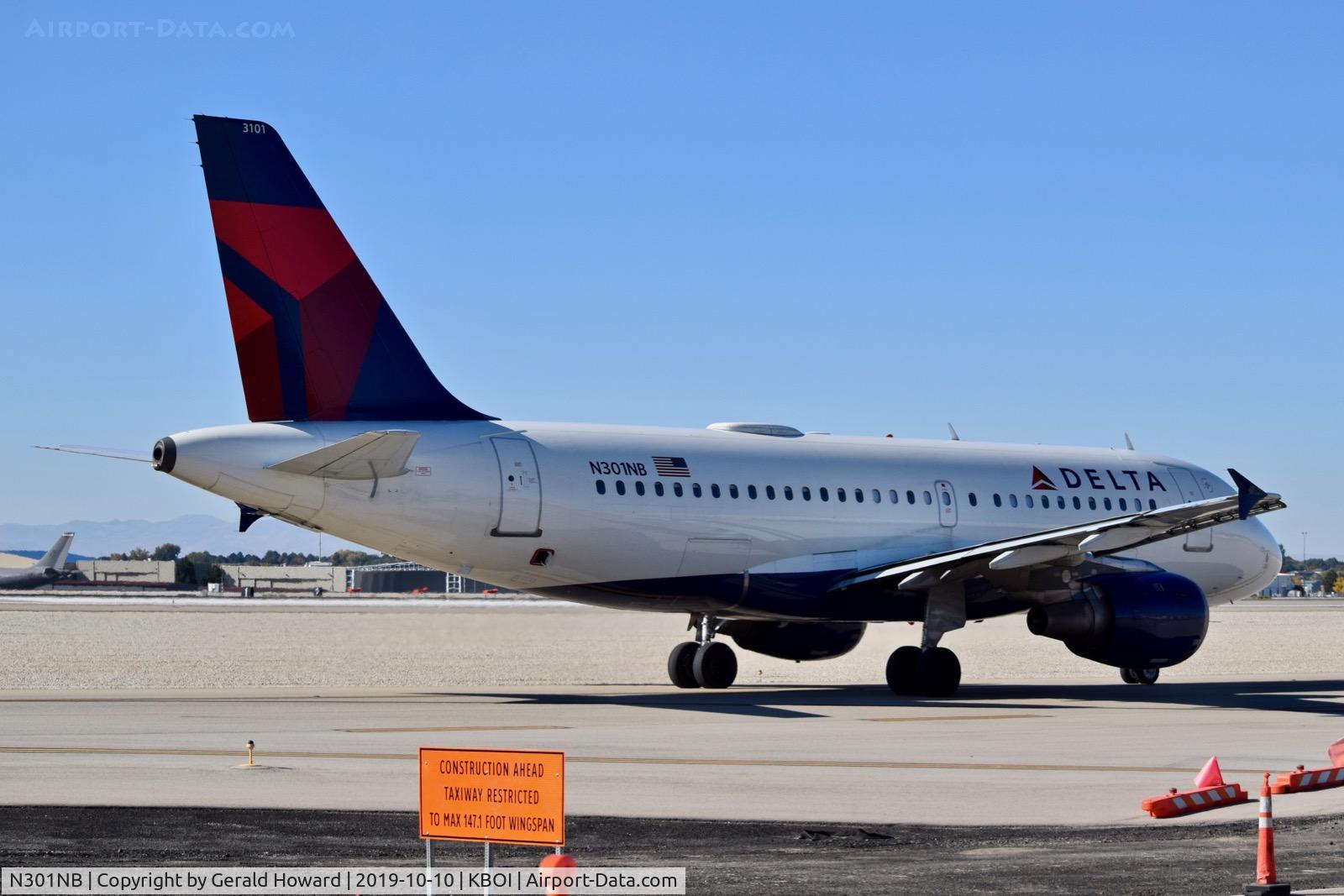N301NB, 1999 Airbus A319-114 C/N 1058, Taxiing on Alpha to TWY 10L.