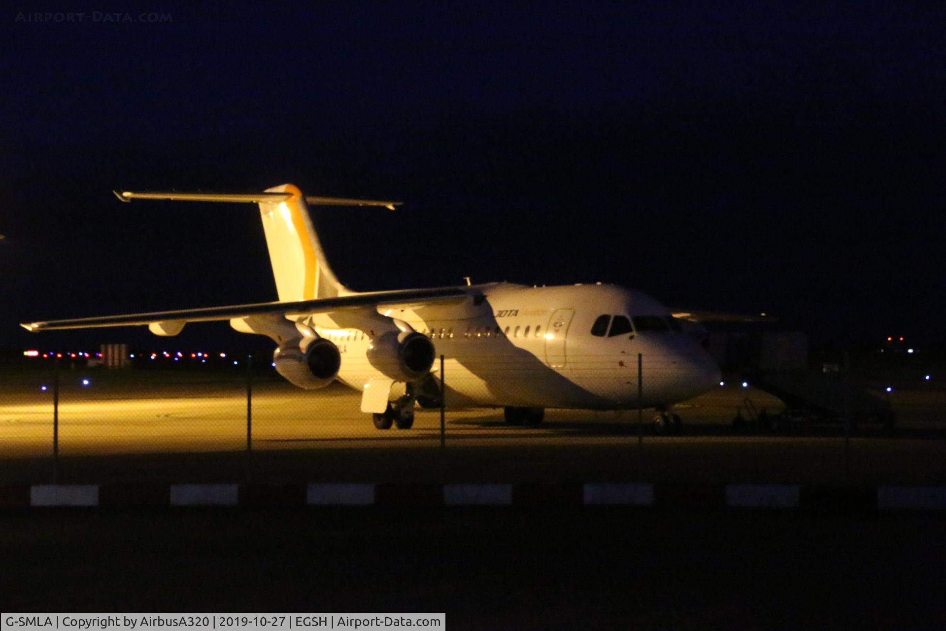 G-SMLA, 1985 British Aerospace BAe.146-200 C/N E2047, Parked under the lights on the Saxon ramp awaiting to collect Man United team following a match with Norwich