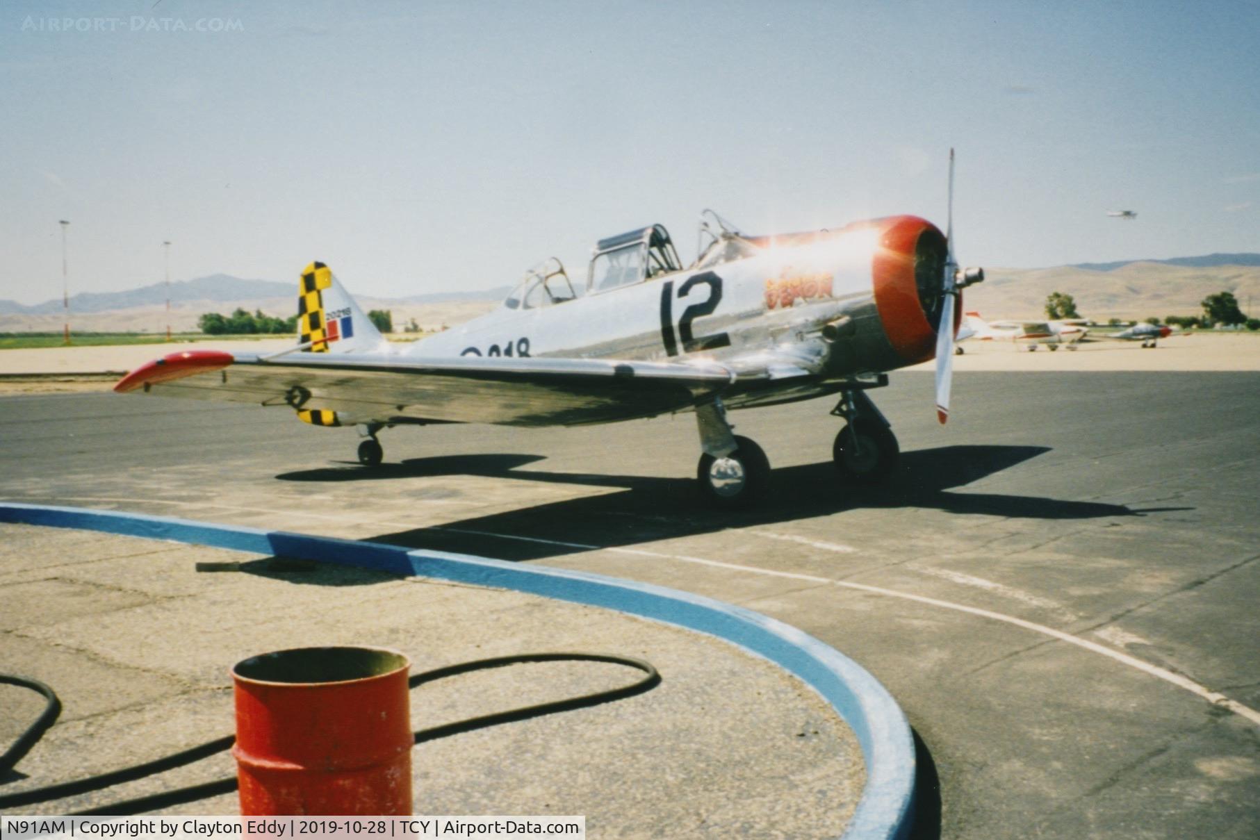 N91AM, 1951 North American Harvard 4 C/N 20218, Tracy Airport California. 1998.