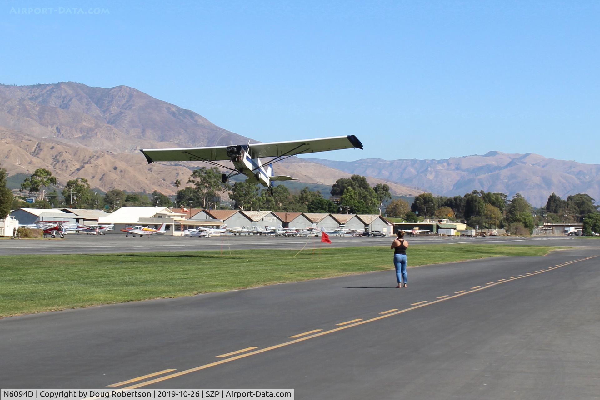 N6094D, 1958 Piper PA-18A-150 Super Cub C/N 18-5461, 1958 Piper PA-18A 150 SUPER CUB, Lycoming O-320 150 Hp, swoop-dive and climb for successfull banner tow pickup on first attempt.
