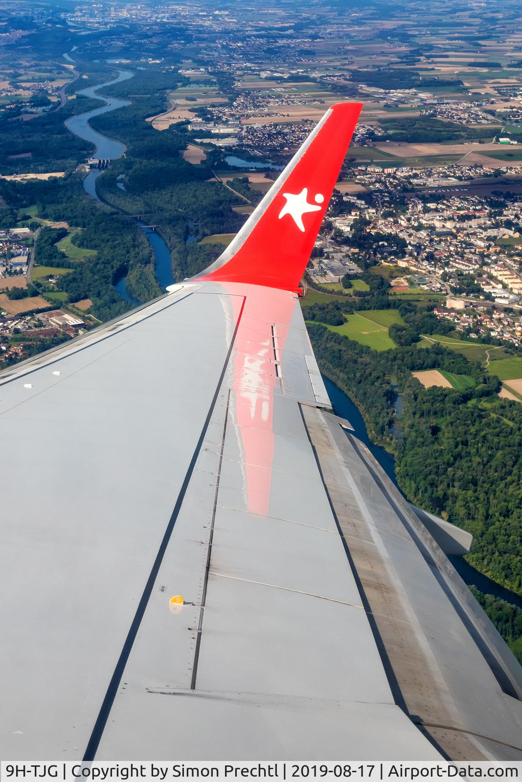 9H-TJG, 1999 Boeing 737-86J C/N 29120, 9H-TJG inflight LNZ-HER