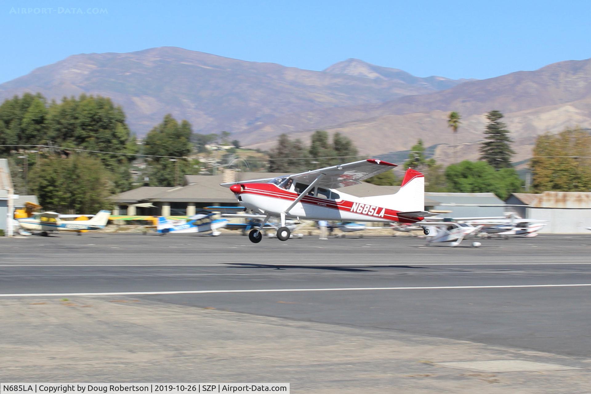 N685LA, 1965 Cessna 185D Skywagon C/N 185-0876, 1965 Cessna 185D SKYWAGON, Continental 0-470 230 Hp, takeoff climb Runway 22, see also photos when pannier-equipped