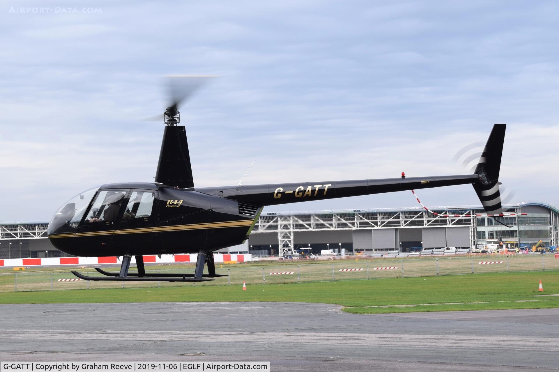G-GATT, 2004 Robinson R44 Raven II C/N 10531, Departing from Farnborough.