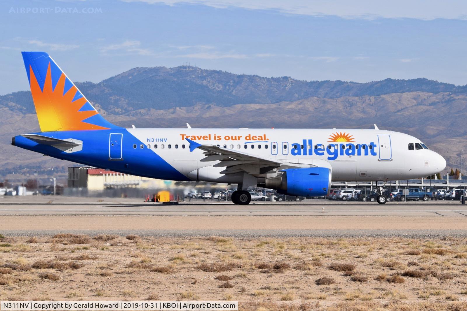 N311NV, 2006 Airbus A319-111 C/N 2702, Take off run on RWY 10L.