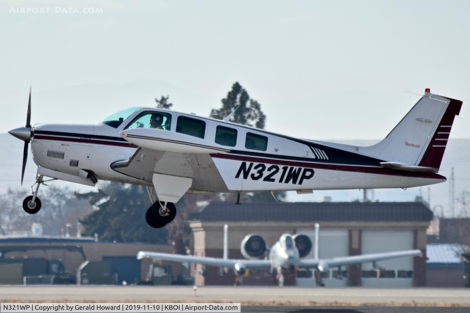 N321WP, 1995 Beech A36 Bonanza 36 C/N E-2929, Take off from 10L.