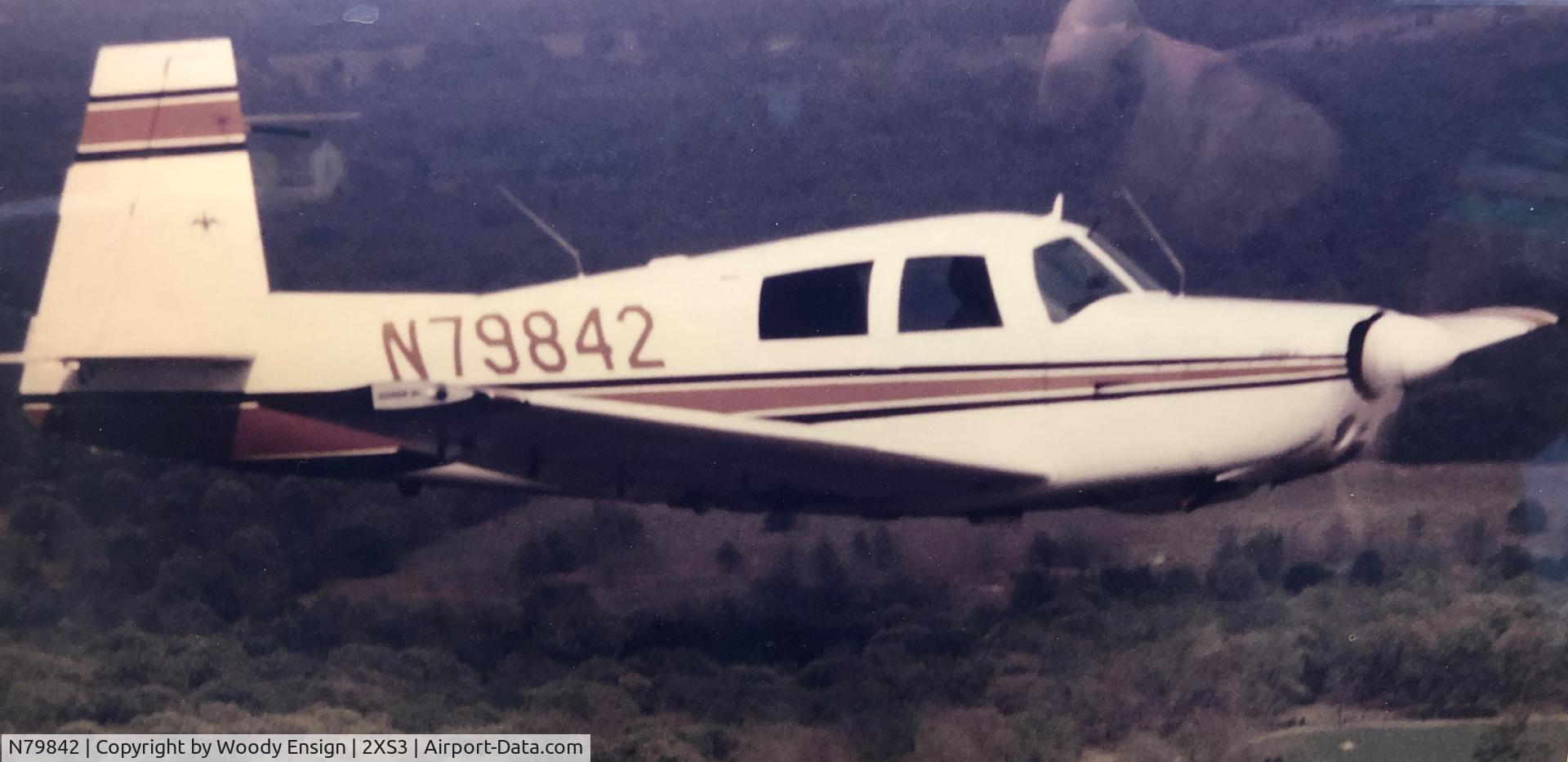 N79842, 1964 Mooney M20E C/N 506, Photo taken over the East Texas piney woods around Athens in 1976.  Mark Logan was PIC at the time the pic was taken